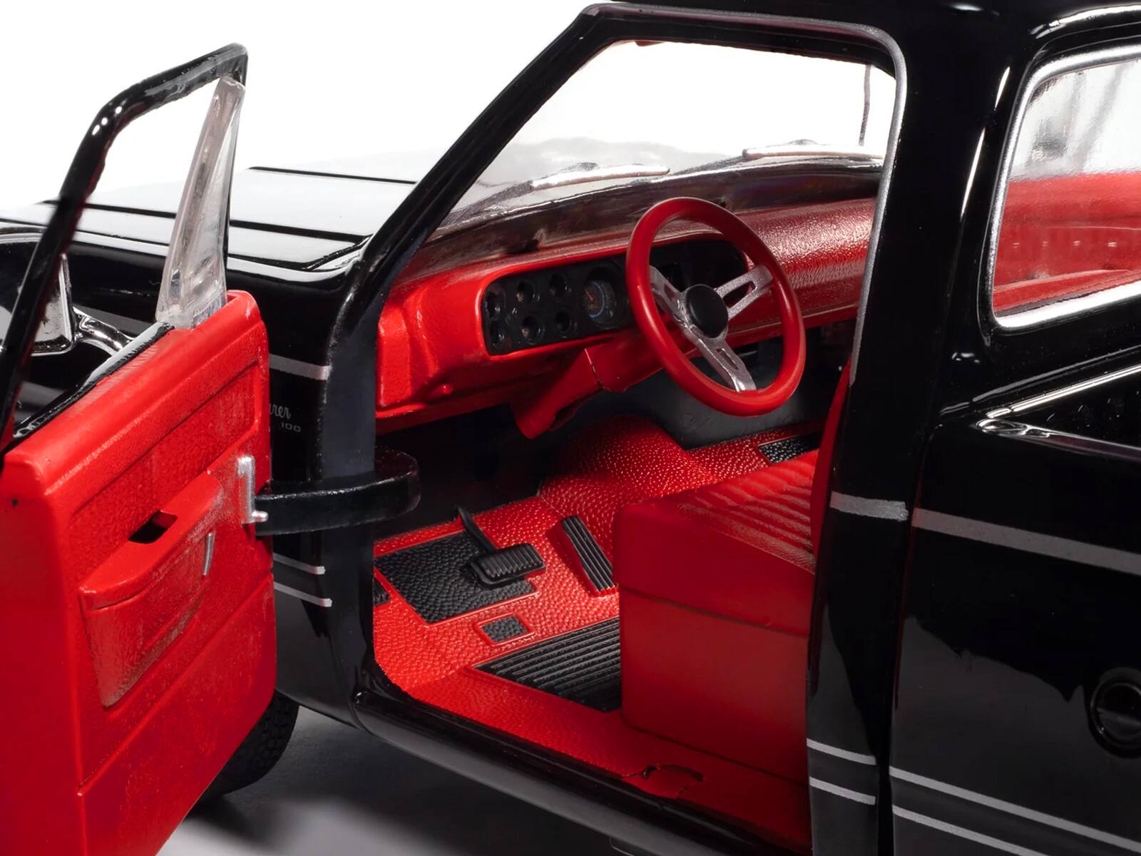 Left. Autoworld - 1979 Dodge Adventurer Sweptline Pickup Truck Black with Red Interior "American Muscle" Series 1/18 - Black with Red.