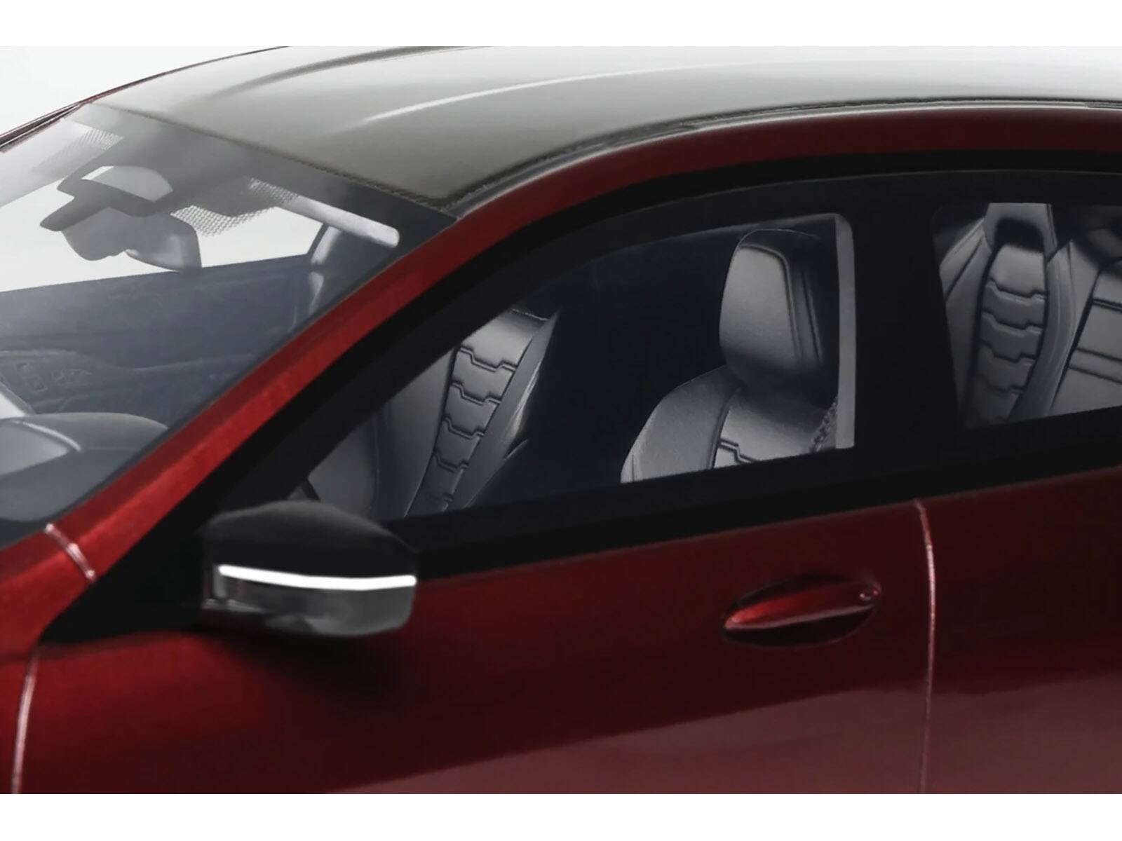 Left. GT Spirit - 2023 BMW M850I xDrive M Performance Aventurine Red with Carbon Top 1/18 Model Car by GT Spirit - Red with Carbon.