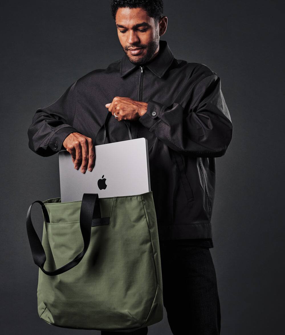 Alt View 2. ALPAKA - Elements Tote 20L Laptop Tote Bag with Padded 16" Sleeve,Open Top with Magnetic Closure - Green Axoflux 210D.