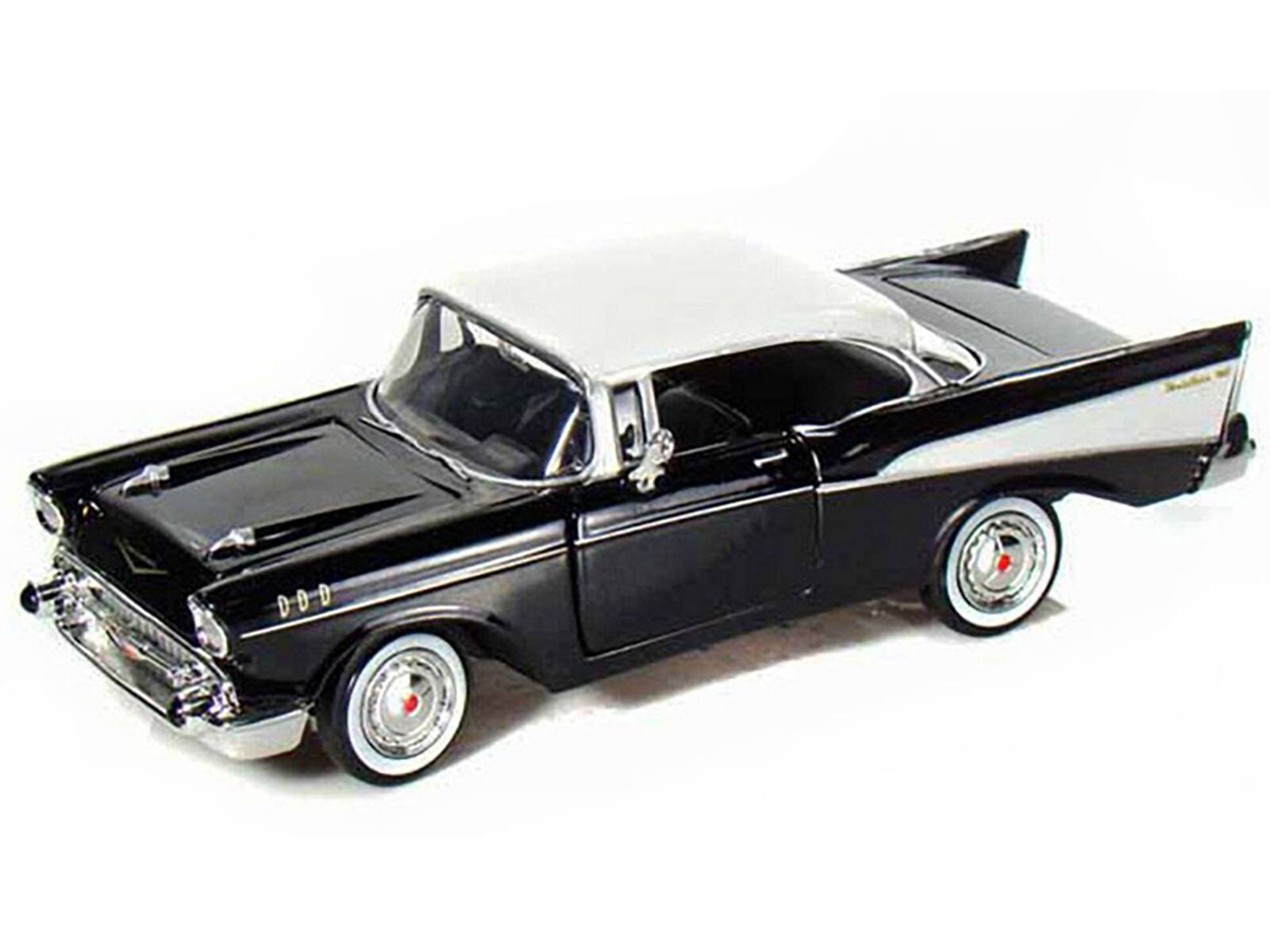 Angle. Motormax - 1957 Chevrolet Bel Air Black with White Top 1/24 Diecast Model Car by Motormax - Black with White.