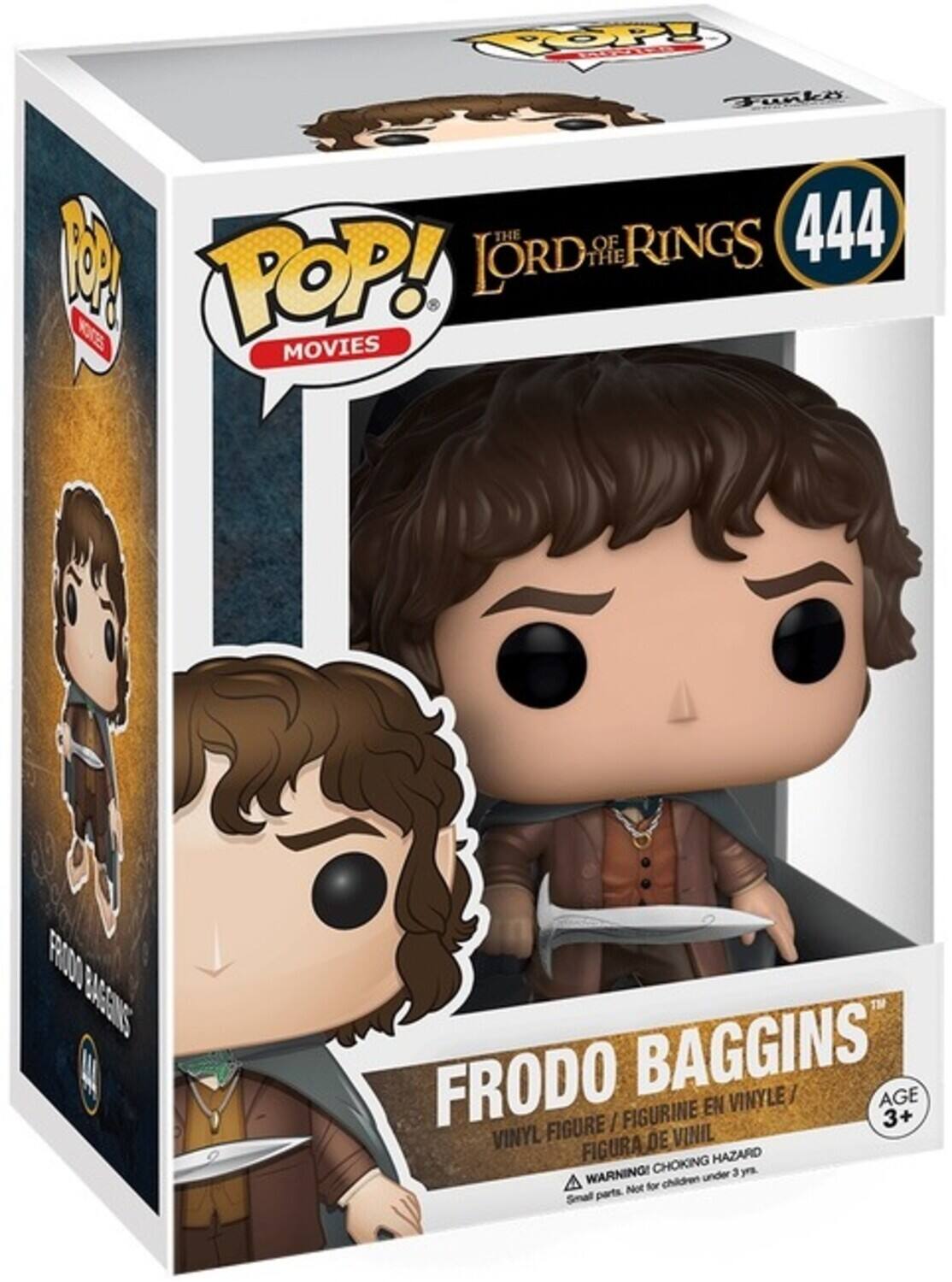 The text on the image is:

"POP! MOVIES THE LORD OF THE RINGS 444 FRODO BAGGINS VINYL FIGURE / FIGURINE EN VINYLE / FIGURA DE VINIL CHOKING HAZARD WARNING! Small parts. Not for children under 3 yrs."