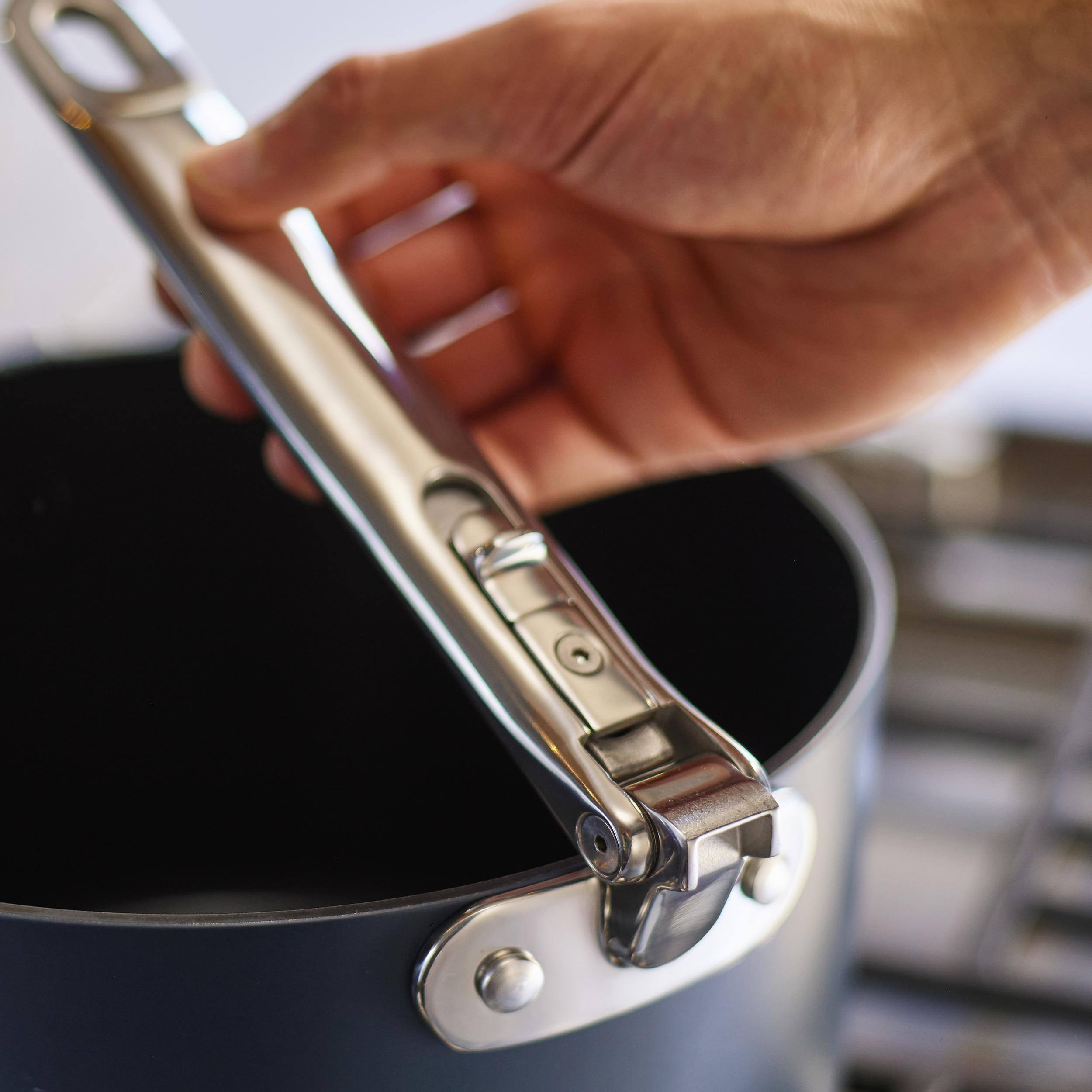 Alt View 4. Joseph Joseph - Space Ceramic Non-stick 6-piece Saucepan Set with Folding Handles - Midnight Blue.