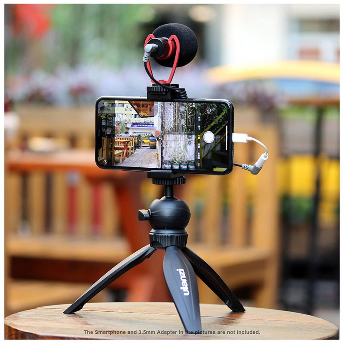The Smartphone and 3.5mm Adapter in the pictures are not included.