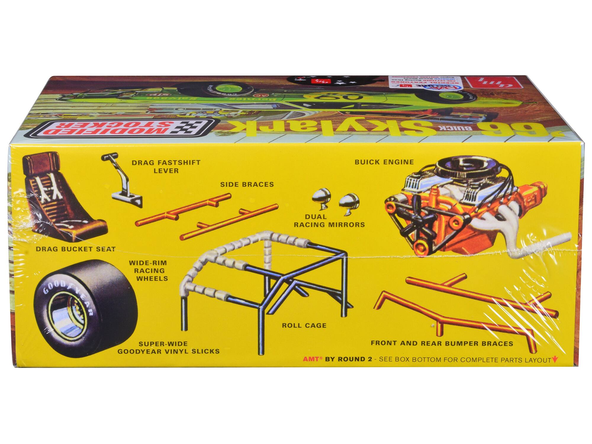 Sure, here is the corrected and grouped text from the image:

---

**SKYHAWK**

**BUICK 99 MODIFIED**

- DRAG FASTSHIFT LEVER
- SIDE BRACES
- DUAL RACING MIRRORS
- DRAG BUCKET SEAT
- WIDE-RIM RACING WHEELS
- SUPER-WIDE GOODYEAR VINYL SLICKS
- ROLL CAGE
- FRONT AND REAR BUMPER BRACES
- BUICK ENGINE

**AMT BY ROUND 2 - SEE BOX BOTTOM FOR COMPLETE PARTS LAYOUT**

---

This text is organized to reflect the components and features of the model kit as shown on the box.