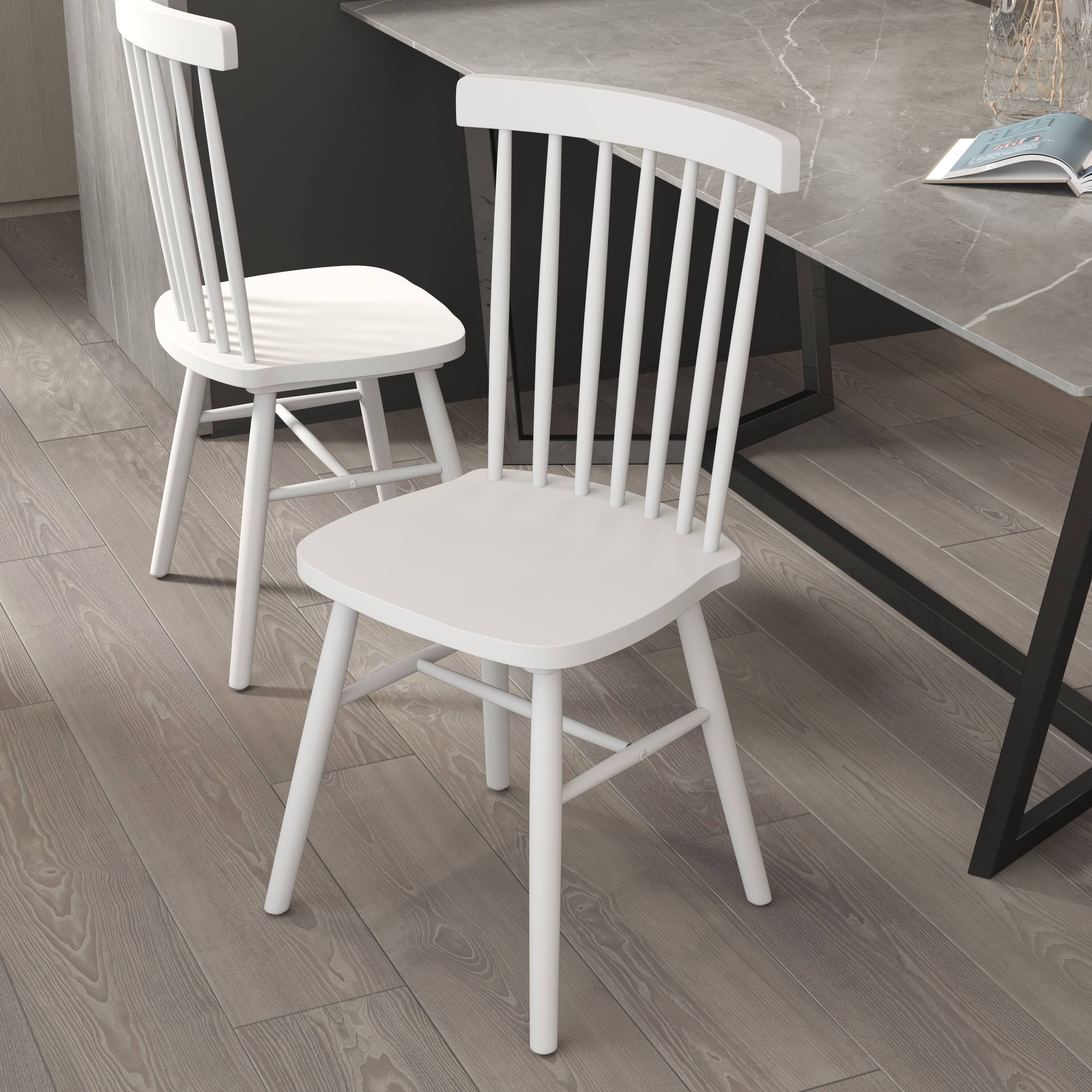 Alt View 4. Emma + Oliver - Canmore Set of Premium Solid Wood Spindle Back Armless Dining Chairs with Saddle Seats and Felt Floor Protectors - White.