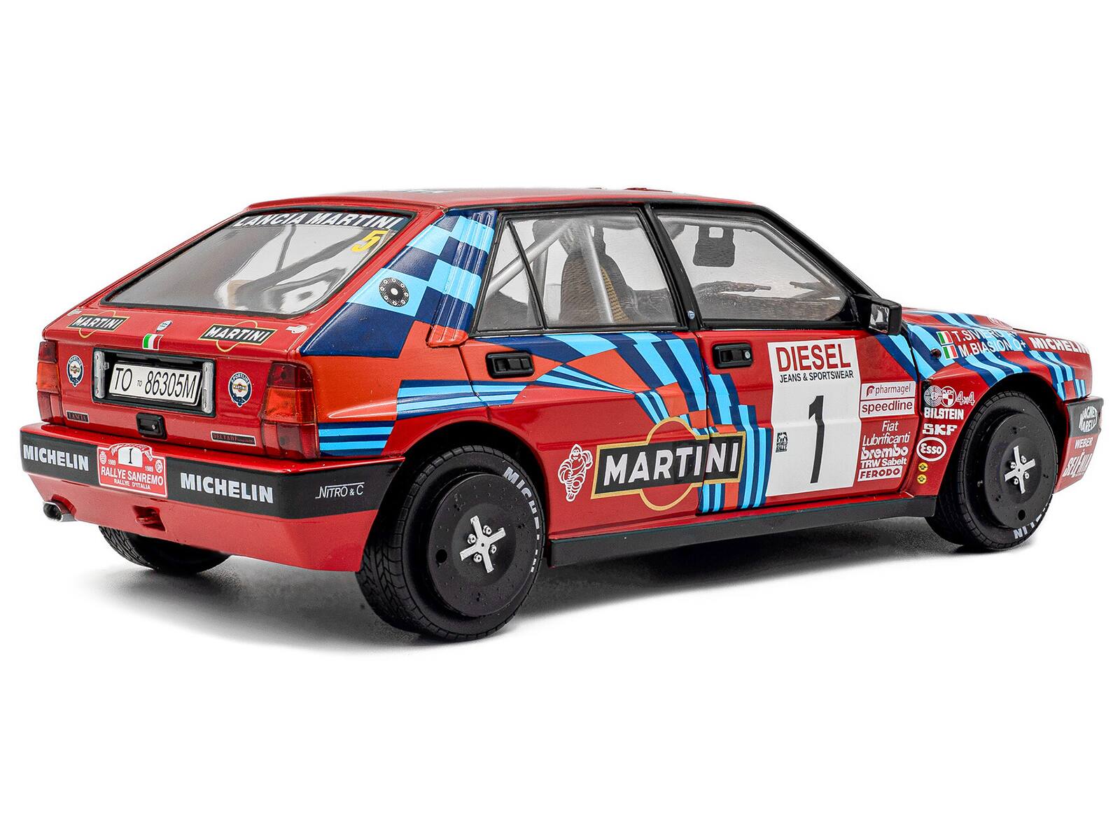 LANCIA MARTINI 2  
NARTINE MARTINI TO 6 86305M  
ic M MICHELIN - I RALLYE - 0 MUR SANREMO PLA  
MICHELIN NITROC  
D T 5V3 C.  
M MBIASIONQ+ BIAS MICHELI DIESEL JEANS & SPORTSWEAR  
pharmagel An speedline BILSTEIN Fiet SKF  
MARTINI I 1  
FERODO brembo TRW Lubrificanti Sabelt Esso  
KSE MICuS NI