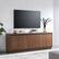 Left. Camden&Wells - Freeport TV Stand for Most TVs up to 75" - Warm Walnut.