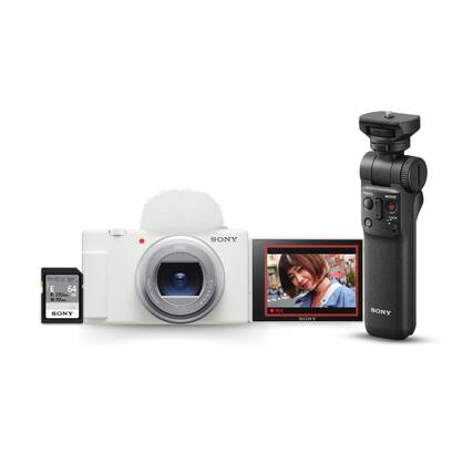 The image features a Sony camera and a Sony video camera, both placed on a white background. The camera is positioned next to a Sony video camera, which is connected to a Sony monitor. The setup also includes a Sony microphone and a Sony tripod, creating a complete Sony camera system.