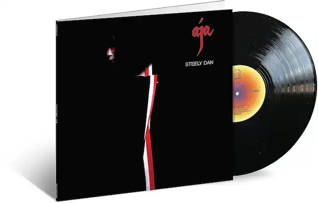 Sure, here is the corrected and grouped text:
---
**Front Cover:**
- **Aja**
- **STEELY DAN**
**Spine:**
- **STEELY DAN**
- **Aja**
- **GEFFEN RECORDS**
**Vinyl Label:**
- **GEFFEN**
- **"Aja"**
- **STEELY DAN**
- **STEREO**
- **K. COM 507**
- **PRODUCED BY DAVID BOWIE**
- **ENGINEERED BY GARY GATE**
- **MIXED BY GARY GATE**
- **MIXED BY GARY GATE**
- **MIXED BY GARY GATE**
- **MIXED BY GARY GATE**
- **MIXED BY GARY GATE**
- **MIXED BY GARY GATE**
- **MIXED BY GARY GATE**
- **MIXED BY GARY GATE**
- **MIXED BY GARY GATE**
- **MIXED BY GARY GATE**
- **MIXED BY GARY GATE**
- **MIXED BY GARY GATE**
- **MIXED BY GARY GATE**
- **MIXED BY GARY GATE**
- **MIXED BY GARY GATE**
- **MIXED BY GARY GATE**
- **MIXED BY GARY GATE**
- **MIXED BY GARY GATE**
- **MIXED BY GARY GATE**
- **MIXED BY GARY GATE**
- **MIXED BY GARY GATE**
- **MIXED BY GARY GATE**
- **MIXED BY GARY GATE**
- **MIXED BY GARY GATE**
- **MIXED BY GARY GATE**
- **MIXED BY GARY GATE**
- **MIXED BY GARY GATE**
- **MIXED BY GARY GATE**
- **MIXED BY GARY GATE**
- **MIXED BY GARY GATE**
- **MIXED BY GARY GATE**
- **MIXED BY GARY GATE**
- **MIXED BY GARY GATE**
- **MIXED BY GARY GATE**
- **MIXED BY GARY GATE**
- **MIXED BY GARY GATE**
-