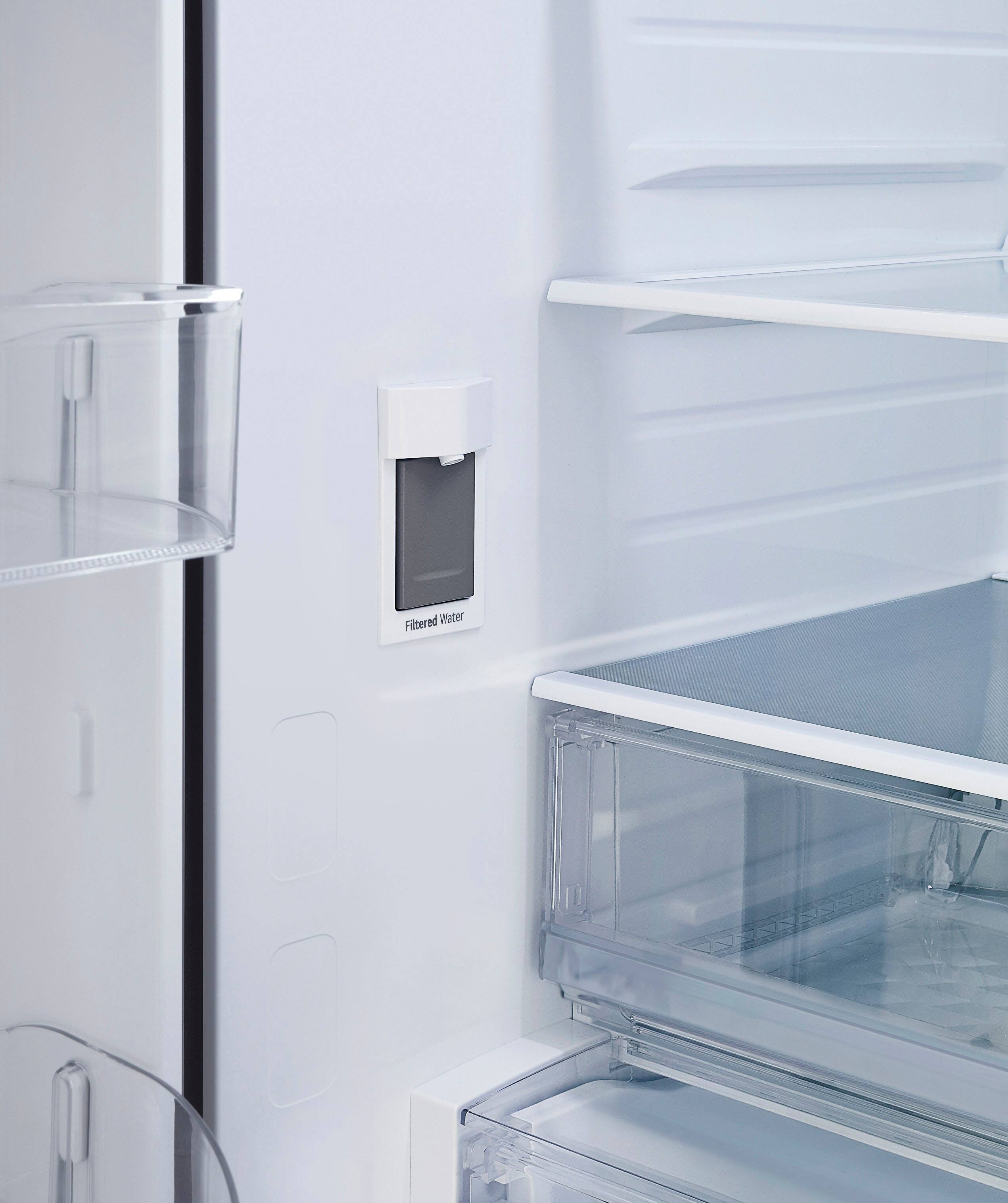 The image shows a refrigerator with a water dispenser on the door. The dispenser is designed to provide filtered water, ensuring that the water is clean and safe to drink. The refrigerator is white, and the water dispenser is located on the door, making it easily accessible for users.