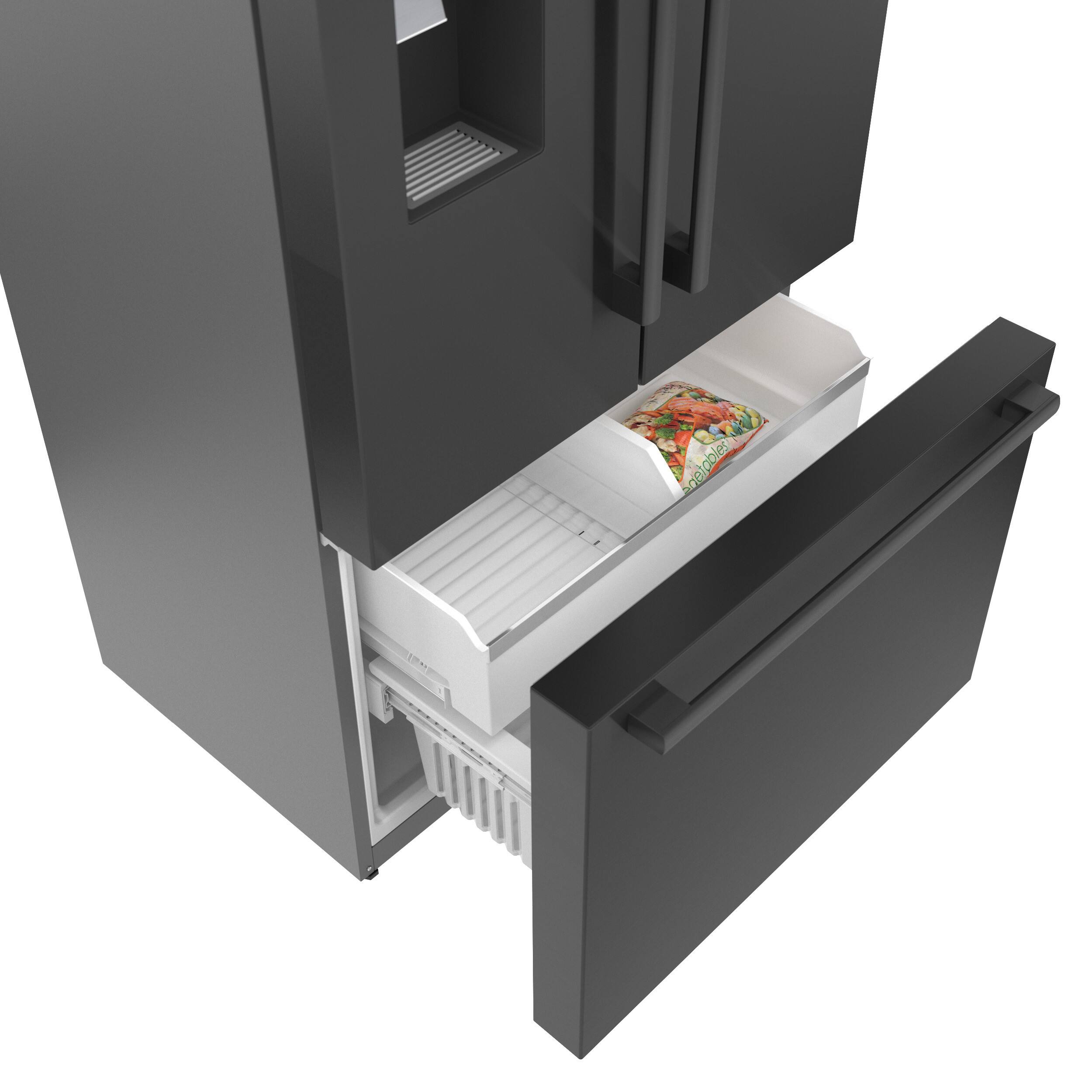 The image shows a black refrigerator with its door open, revealing a drawer containing a colorful paper towel. The paper towel is placed on a white surface, and the refrigerator is positioned in a room.
