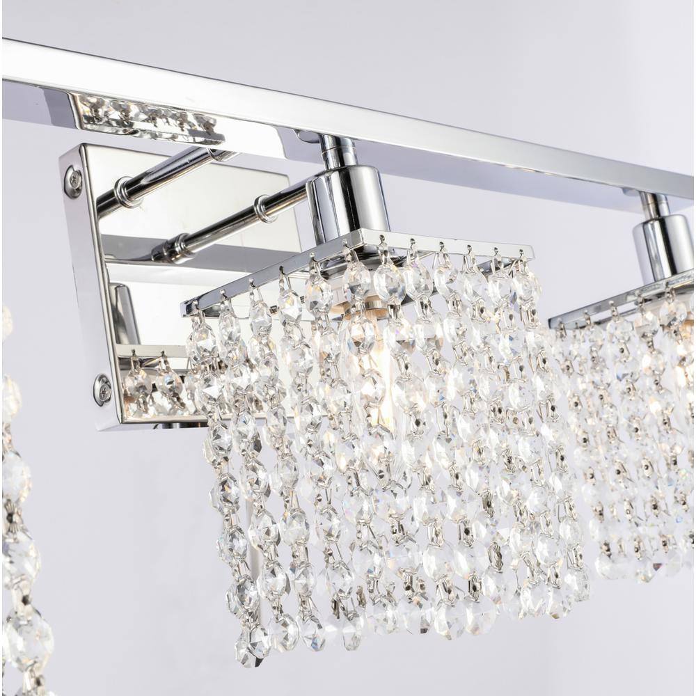 Left. Living District - Phineas 4 light Chrome and Clear Crystals wall sconce - Chrome And Clear Crystals.