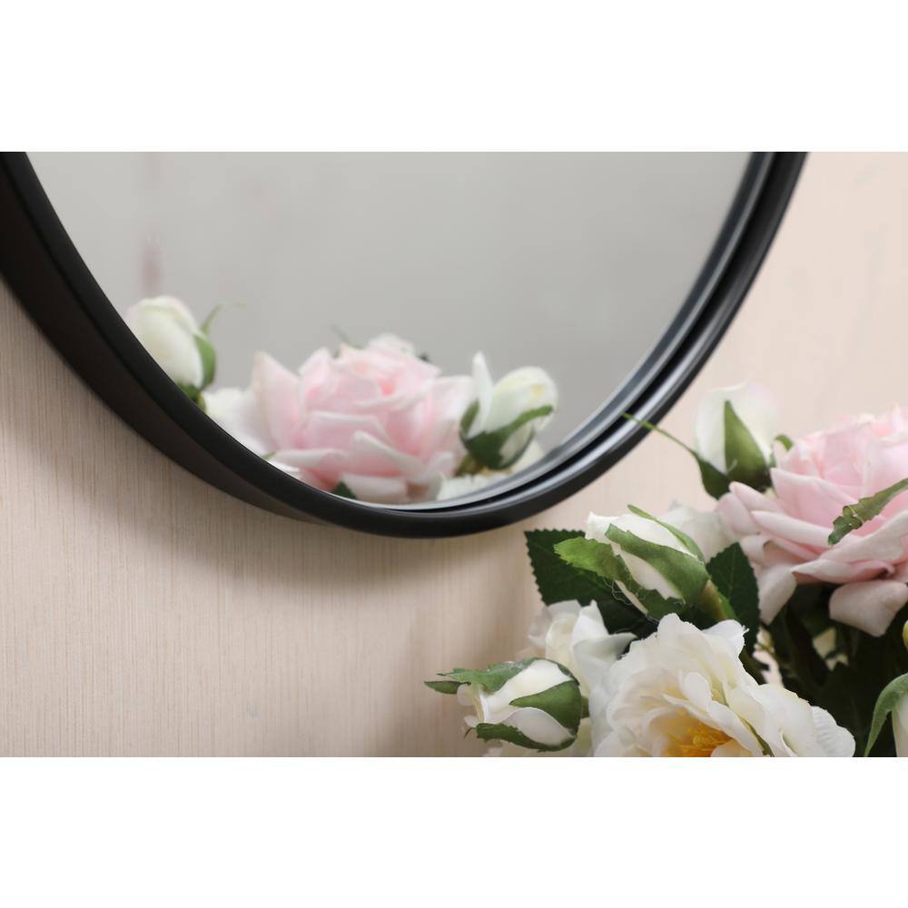 Left. Elegant Decor - Metal frame round mirror 21 inch in Black - Black.