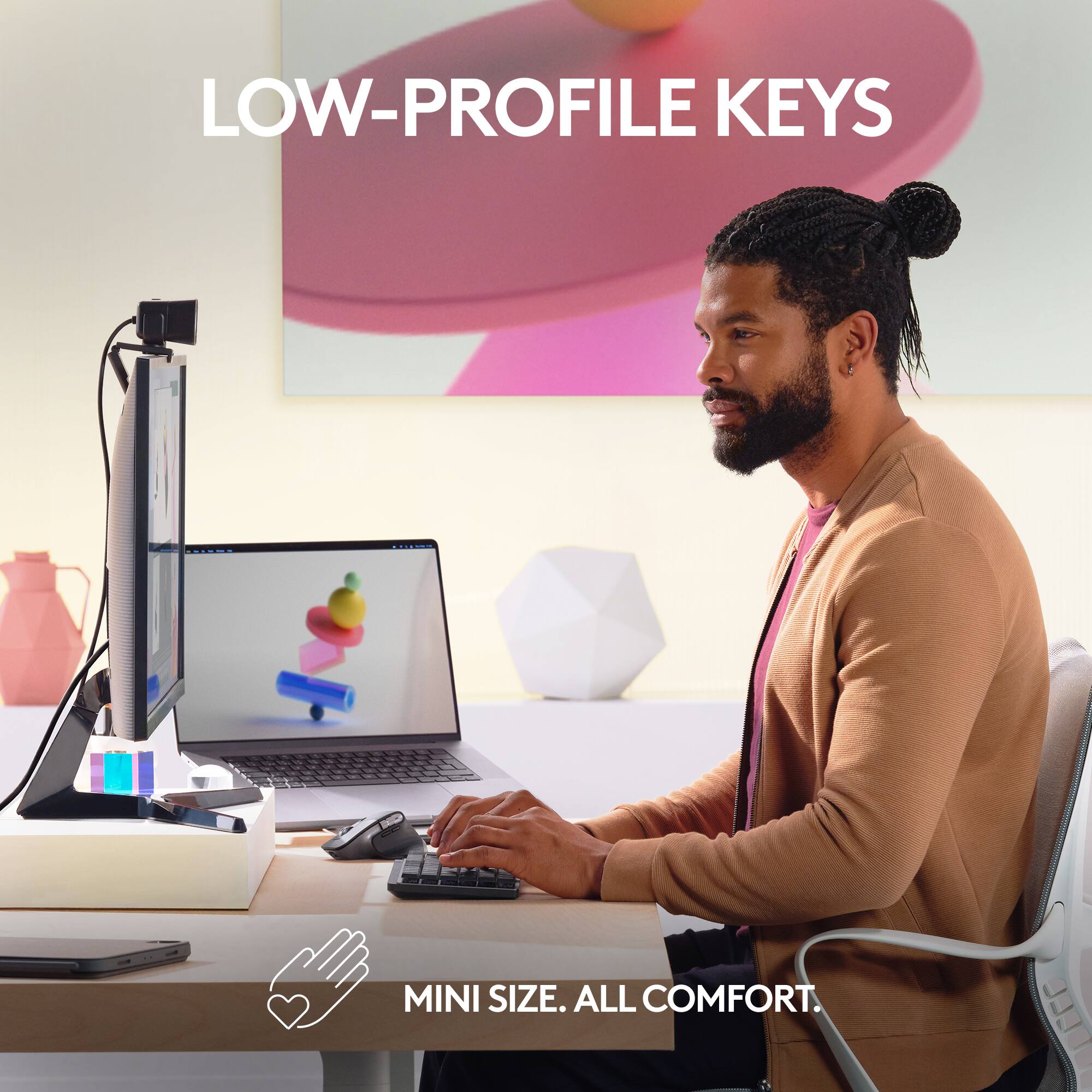 The text on the image reads "LOW-PROFILE KEYS | MINI SIZE. ALL COMFORT."