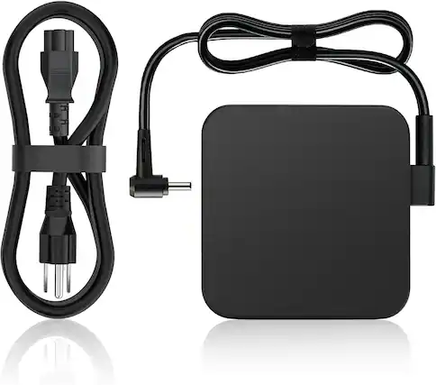 Front. Core Tech - 90W Laptop Power Adapter with 4.5 x 3.0mm Round Tip and AC Cord - Black.