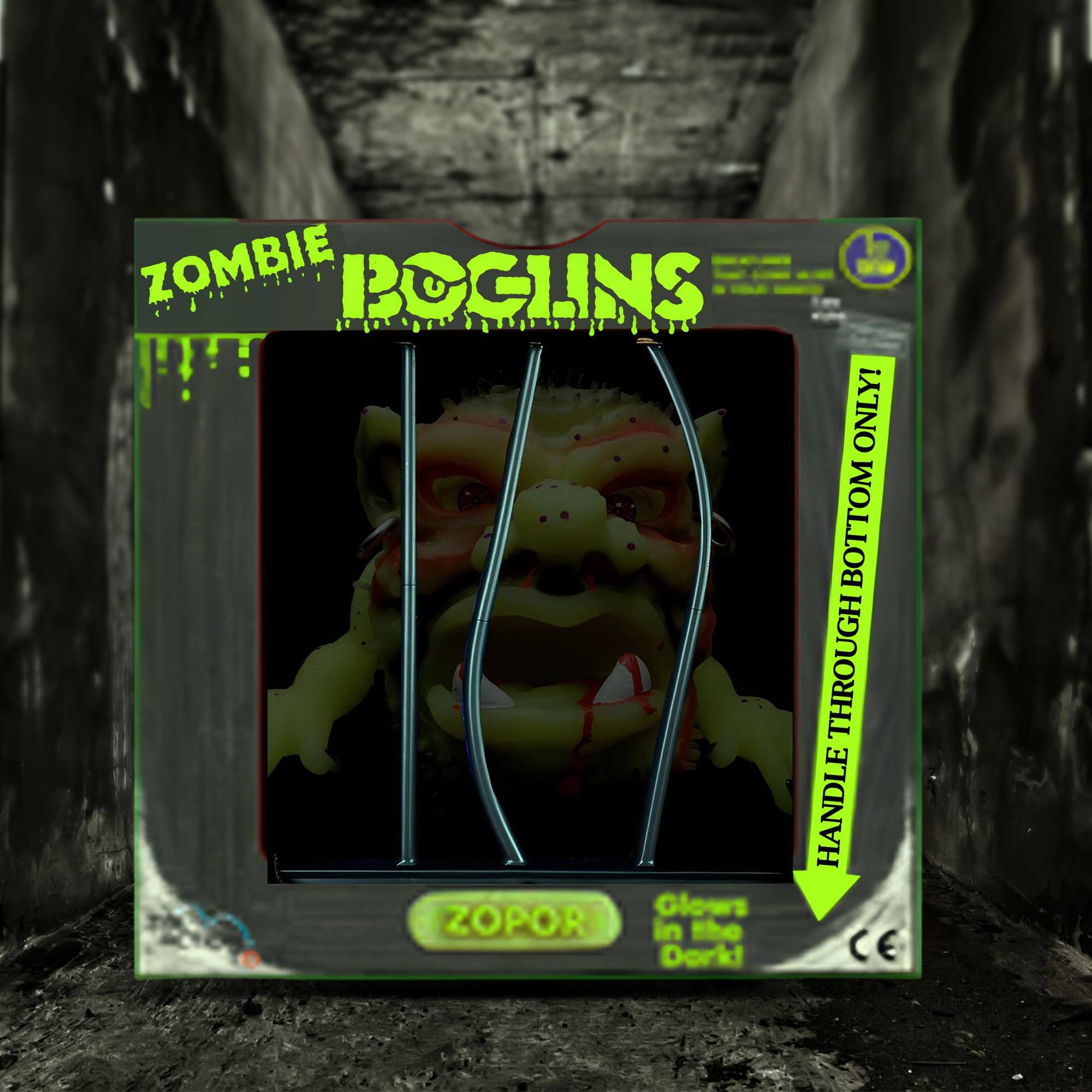 ZOMBIE BOGLINS ONLY!  
HANDLE THROUGH BOTTOM ONLY  
Glows in the Dark  
ZOPOR  
CE