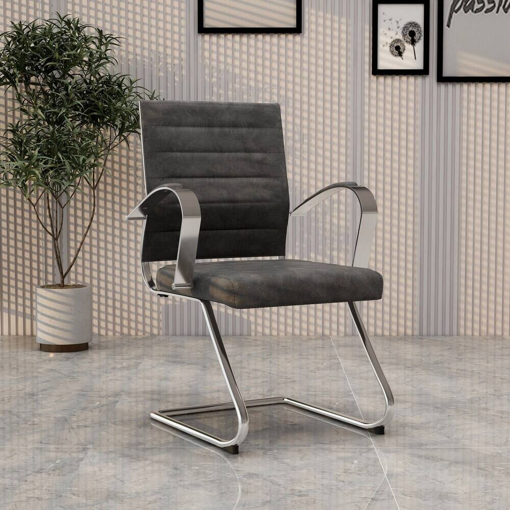 Angle. LeisureMod - Set of 4 Benmar Modern Leather Upholstered Office Desk Chair with Padded Armrests and Chrome Frame for Home or Office - Charcoal.