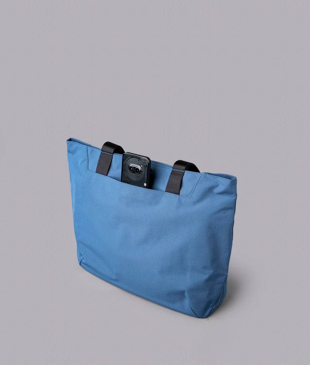 Alt View 5. ALPAKA - Elements Tote 20L Laptop Tote Bag with Padded 16" Sleeve,Open Top with Magnetic Closure - Blue Axoflux 210D.