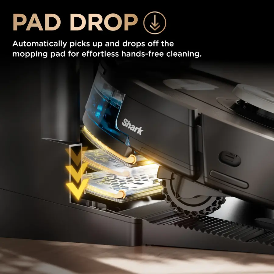 The text on the image reads: "PAD DROP Automatically picks up and drops off the mopping pad for effortless hands-free cleaning. Shark."