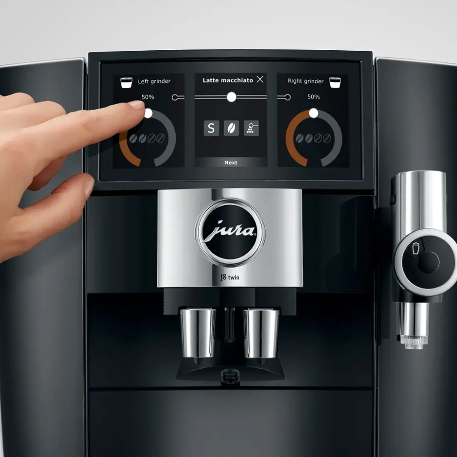 The text on the image reads:

"Left grinder Latte macchiato X Right grinder 50% 50% S ... Next jura 18 twin"

Corrected text:

"Left grinder Latte macchiato X Right grinder 50% 50% S ... Next jura 18 twin"

The text is already correctly grouped and does not require any further changes.