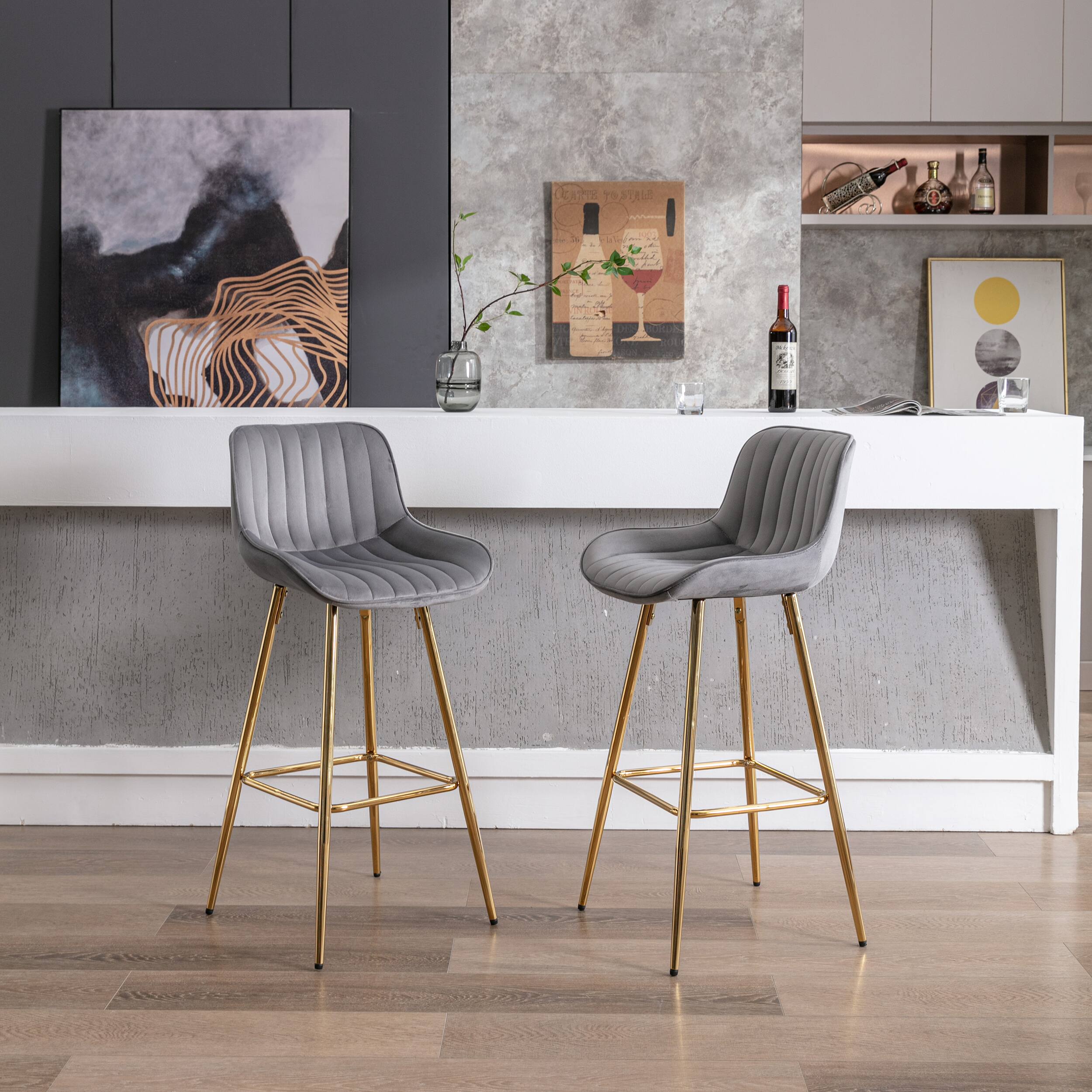 Certainly! Here is the corrected and grouped text from the image:

**Left Painting:**
- "CEtes TOSTRA O."

**Center Painting:**
- "CREAM TO STIR"
- "WINE"
- "VINTAGE"
- "2015"
- "CHATEAU"
- "VOLTAIRE"
- "Bordeaux"
- "FRANCE"

**Right Painting:**
- (No discernible text, just a yellow circle on a gray background)