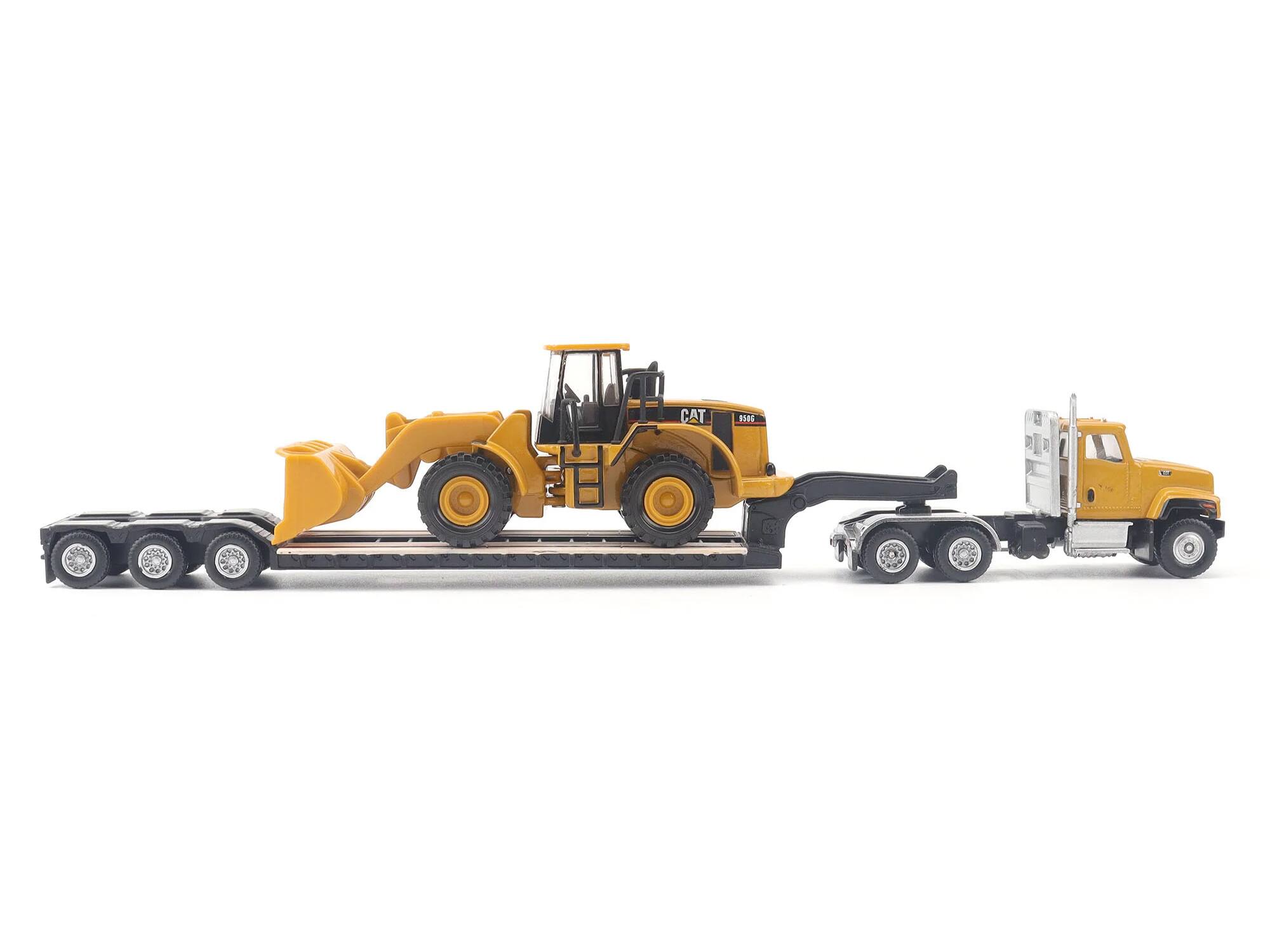 Left. Diecast Masters - CAT Caterpillar CT681 Day Cab Tractor Yellow with Lowboy Trailer and CAT 950G Wheel Loader Yellow 1/87 (HO) Diecast - Yellow .
