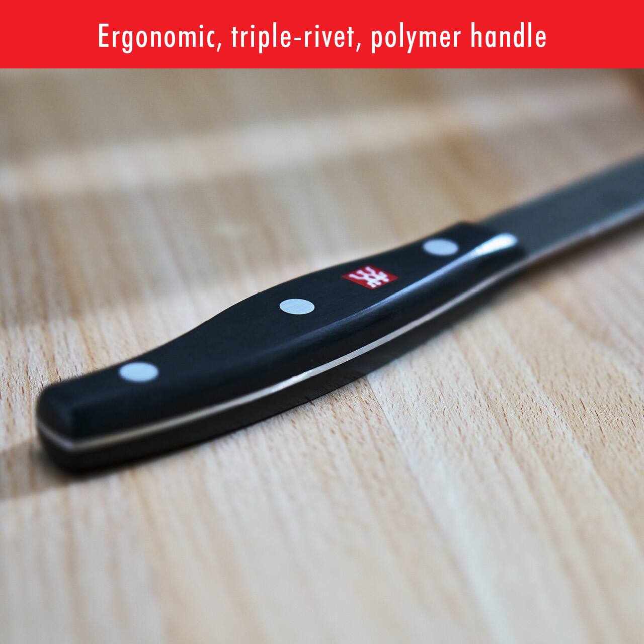 Ergonomic, triple-rivet, polymer handle