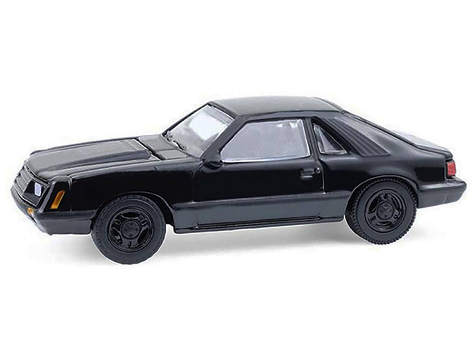 Angle. Greenlight - 1979 Ford Mustang Fastback Black "Black Bandit" Series 30 1/64 Diecast Model Car by Greenlight - Black.