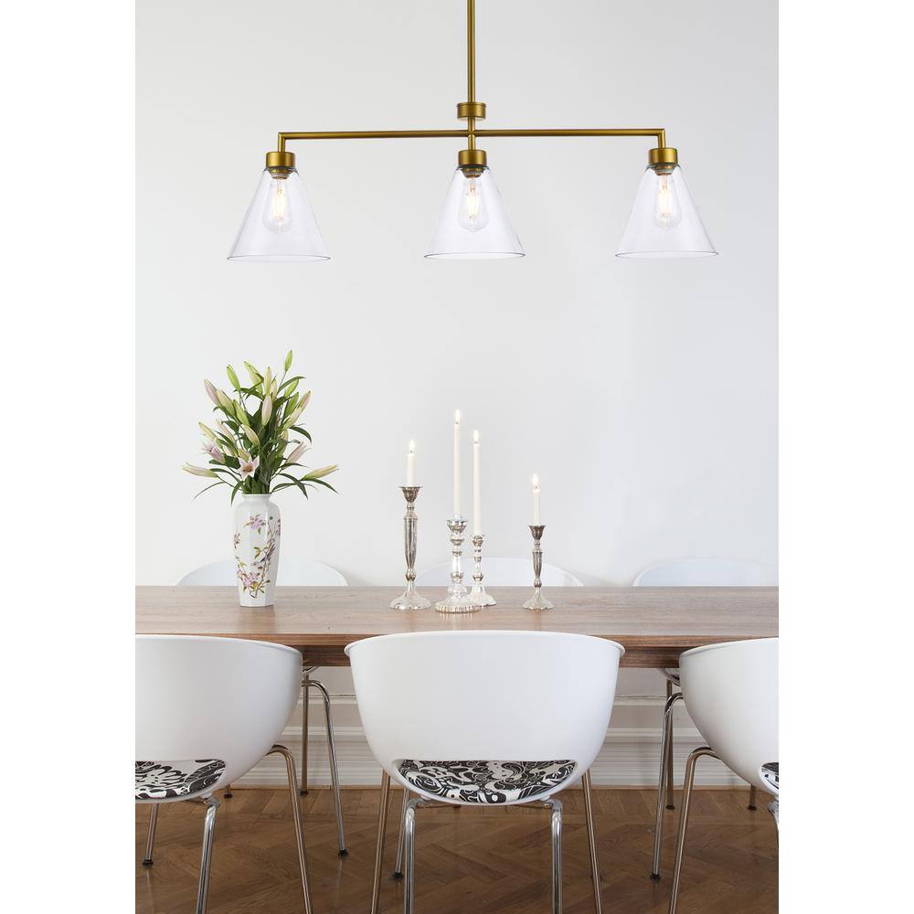 Left. Living District - Mera 3 lights brass pendant - Brass And Clear.