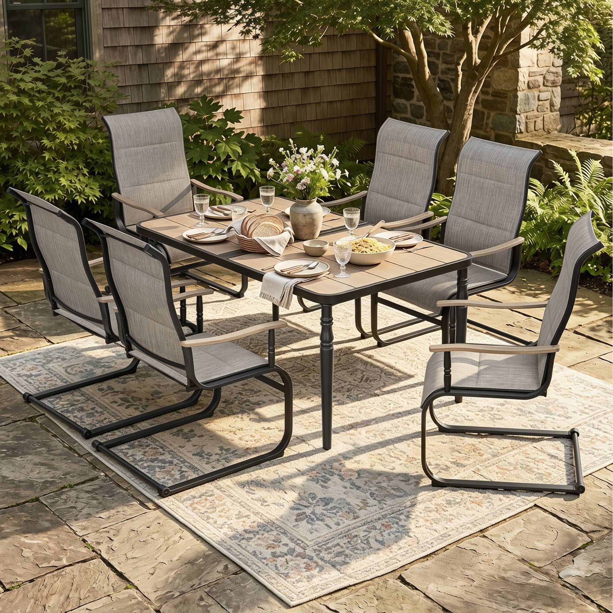 Angle. Nuu Garden - 7-Piece Patio Dining Set with Umbrella Hole, Breathable Textilene Fabric - Brown and Black.