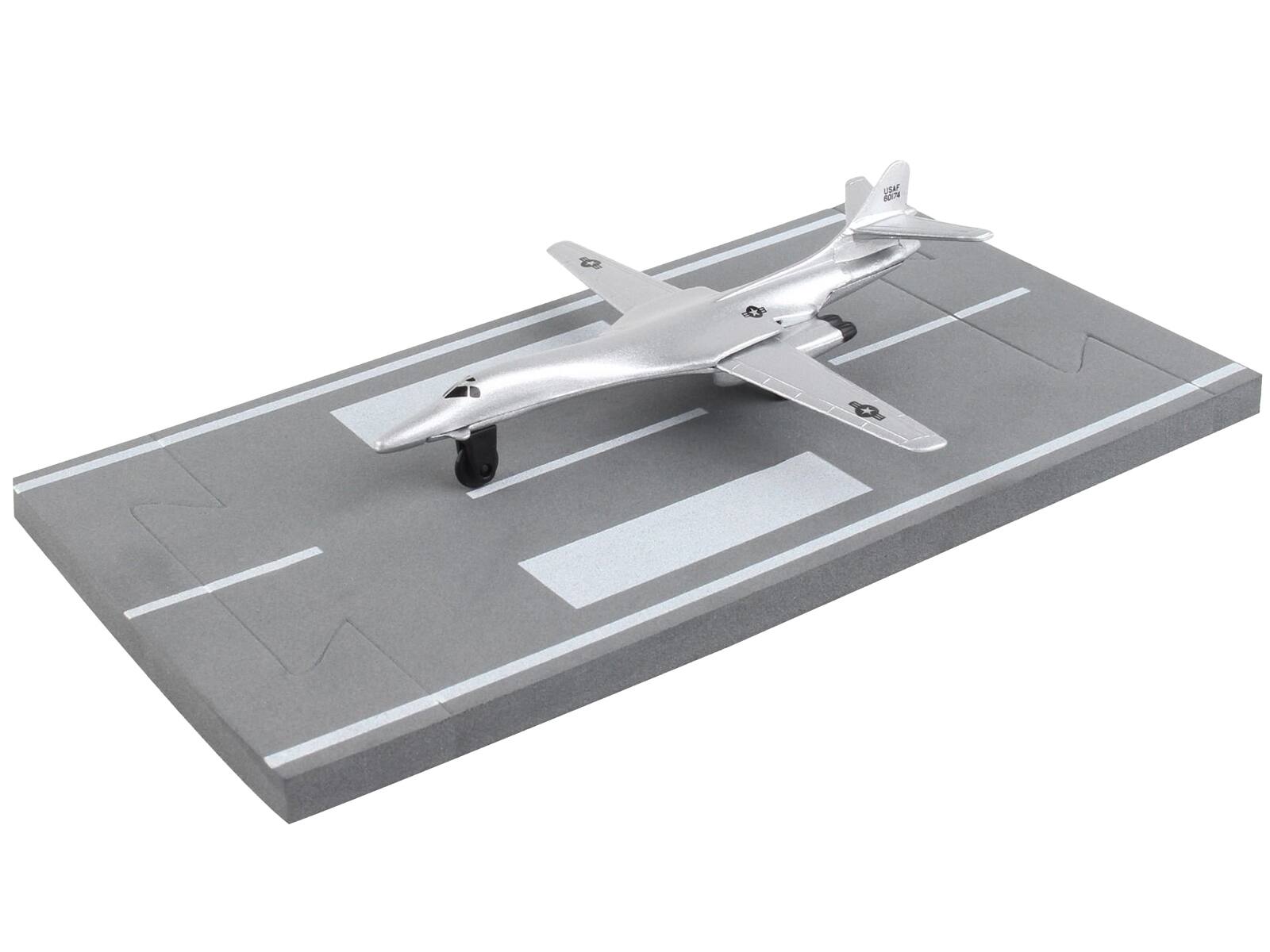 Left. Runway24 - Rockwell B-1 Lancer Bomber Aircraft Silver Metallic United States Air Force with Runway Section Diecast Model Airplane - Silver Metallic.