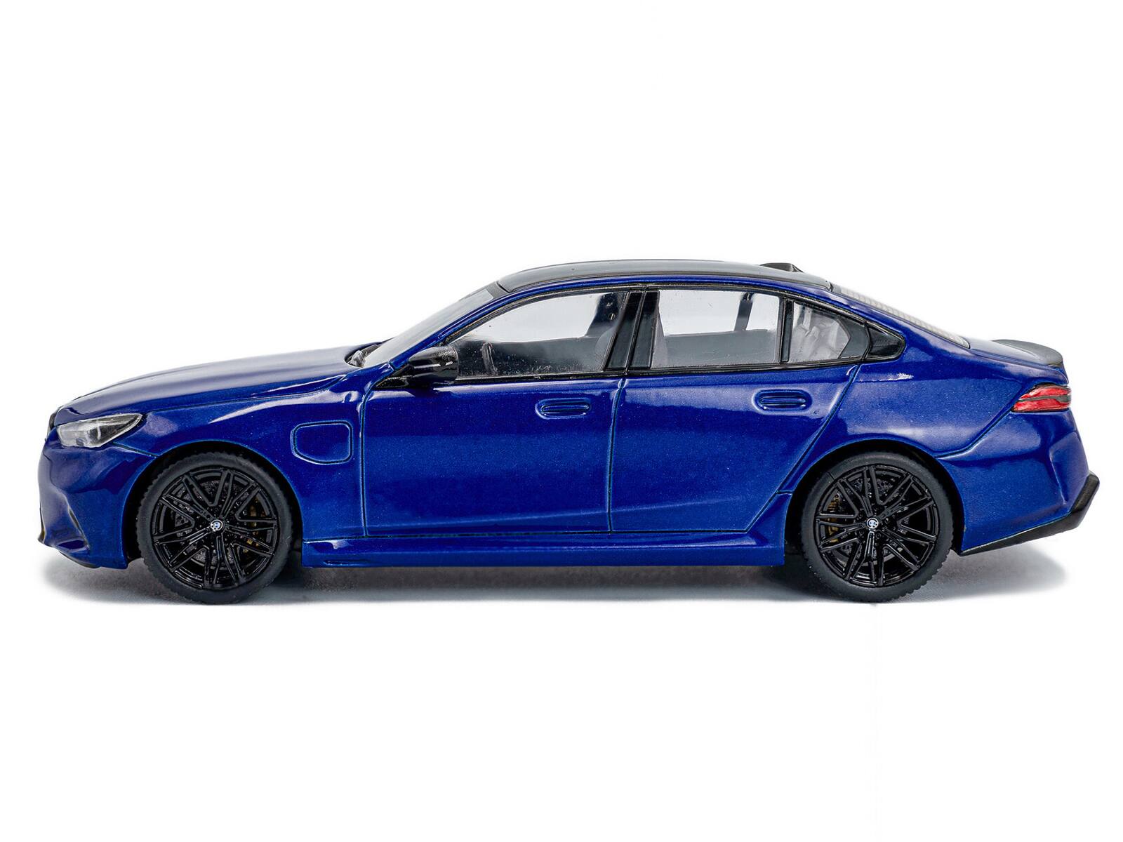 Alt View 1. Solido - 2024 BMW M5 Sedan Marina Bay Blue Metallic with Black Top 1/43 Diecast Model Car by Solido.
