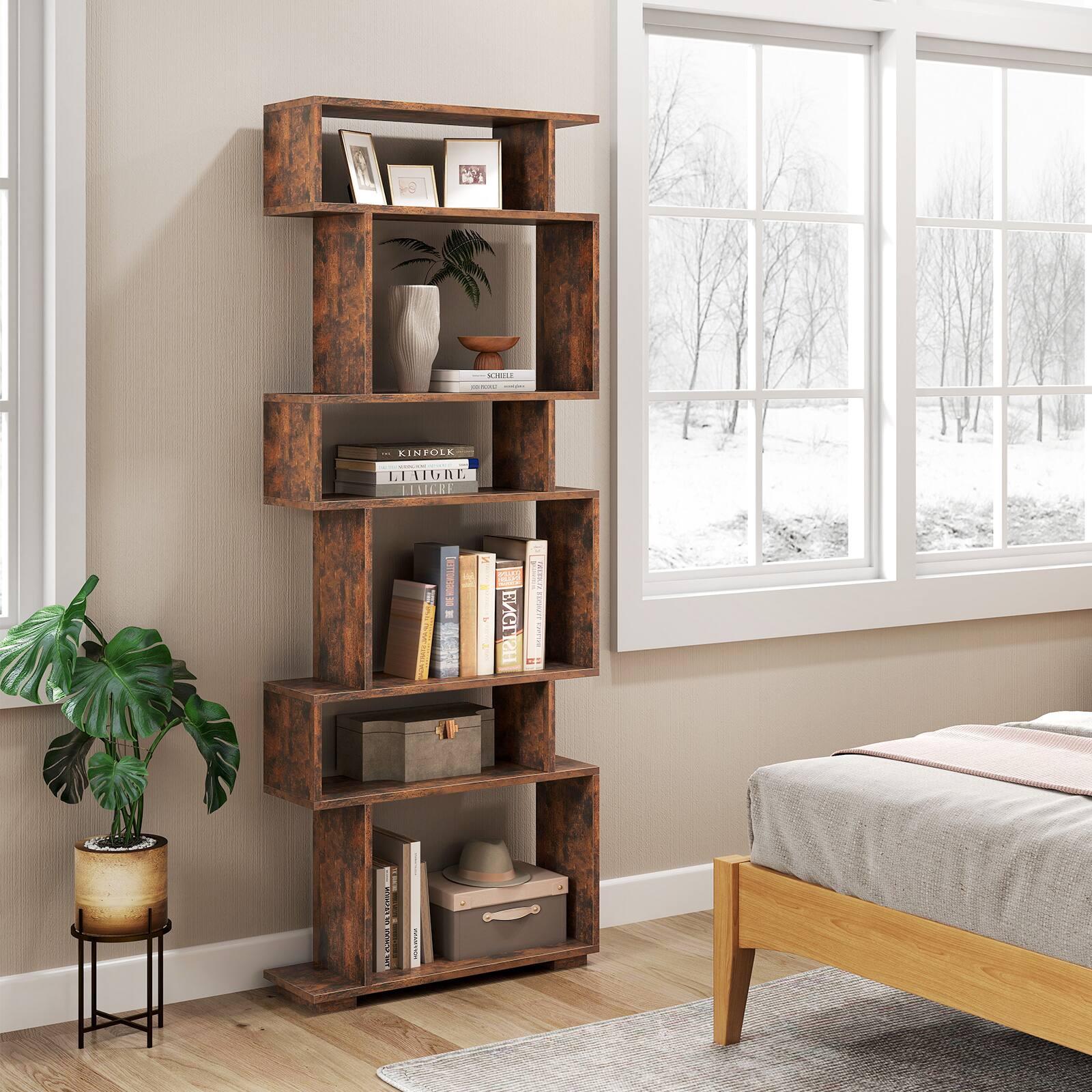 The image shows a wooden bookshelf with a variety of books on it. The bookshelf is located next to a window, and there is a bed in the room as well. The books on the shelf are arranged in a way that makes them easily accessible for reading. The bookshelf is a functional and decorative piece of furniture that adds character to the room.