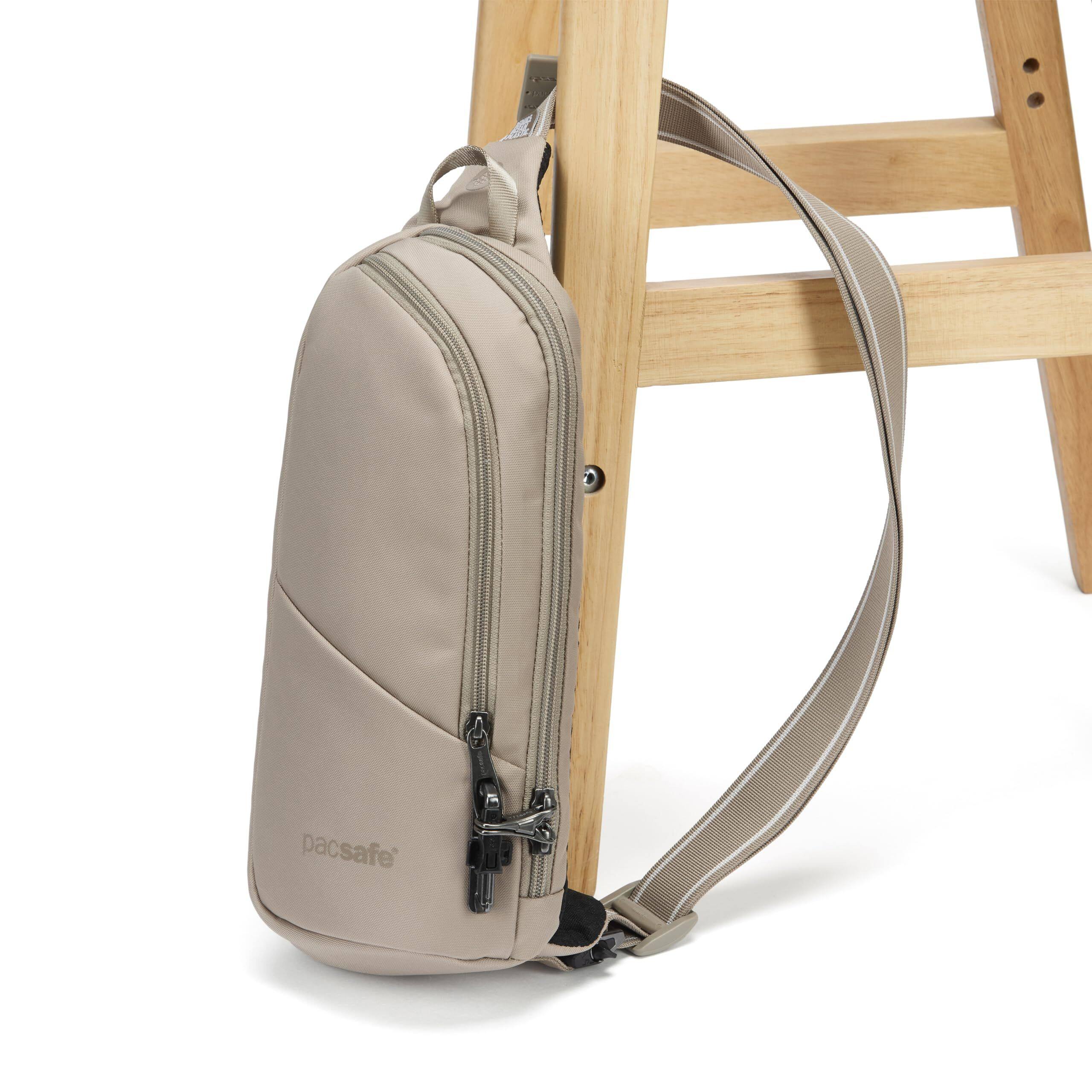 Left. Pacsafe - Vibe 150 Action Sling Pack - Beige.