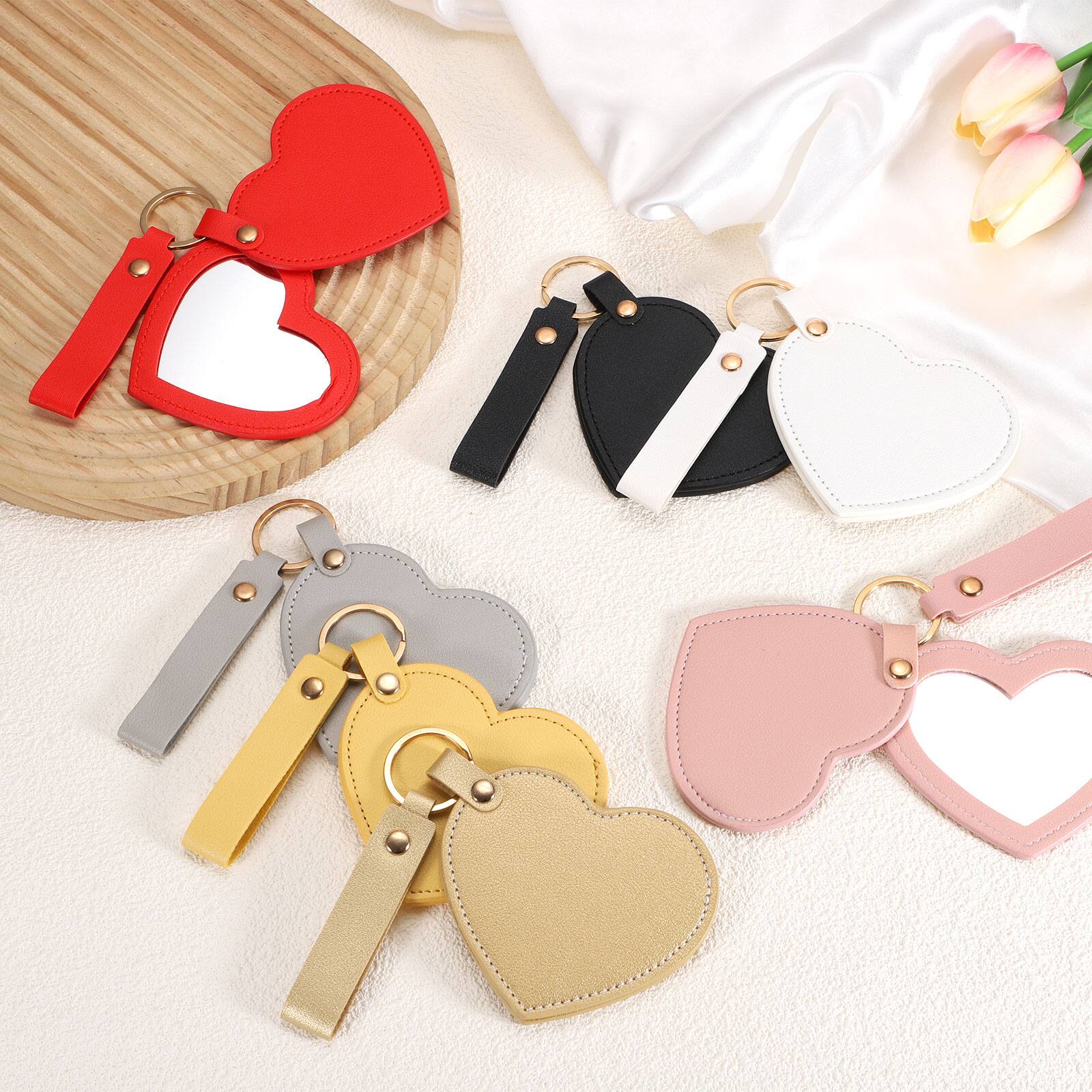Alt View 3. Unique Bargains - Keychain Mirror, Mini Compact Mirror with PU Leather Cover Heart Shape Rotating Folding Keyring for Women - Lemon Yellow.