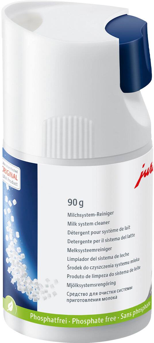 The text on the image reads: "matsradl ORIGINAL tested URA 90 g Milchsystem-Reiniger Milk system cleaner de lait Dtergent pour systme del latte Detergente per il sistema Melksyste-reiniger de leche Limpiador del sistema mleka Srodek do czyszczenia systemu leite de do sistema Produto de limpeza Mjlksystemsrengring - Sans phosphate Phosphatfrei Phosphate free."