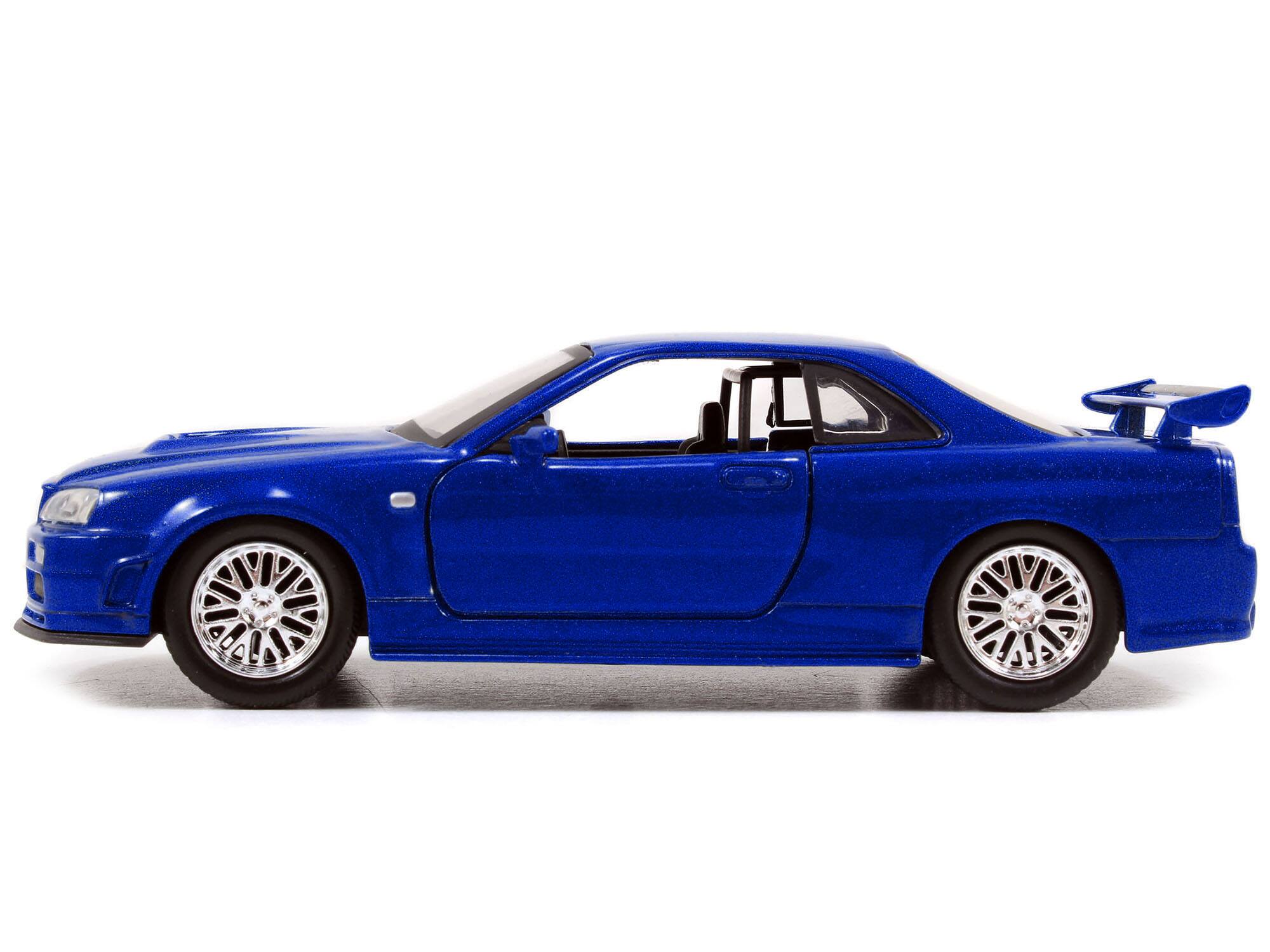 Angle. Jada - Brian's Nissan Skyline GT-R R34 Blue "Fast & Furious" Movie 1/32 Diecast Car Model by Jada - Blue.