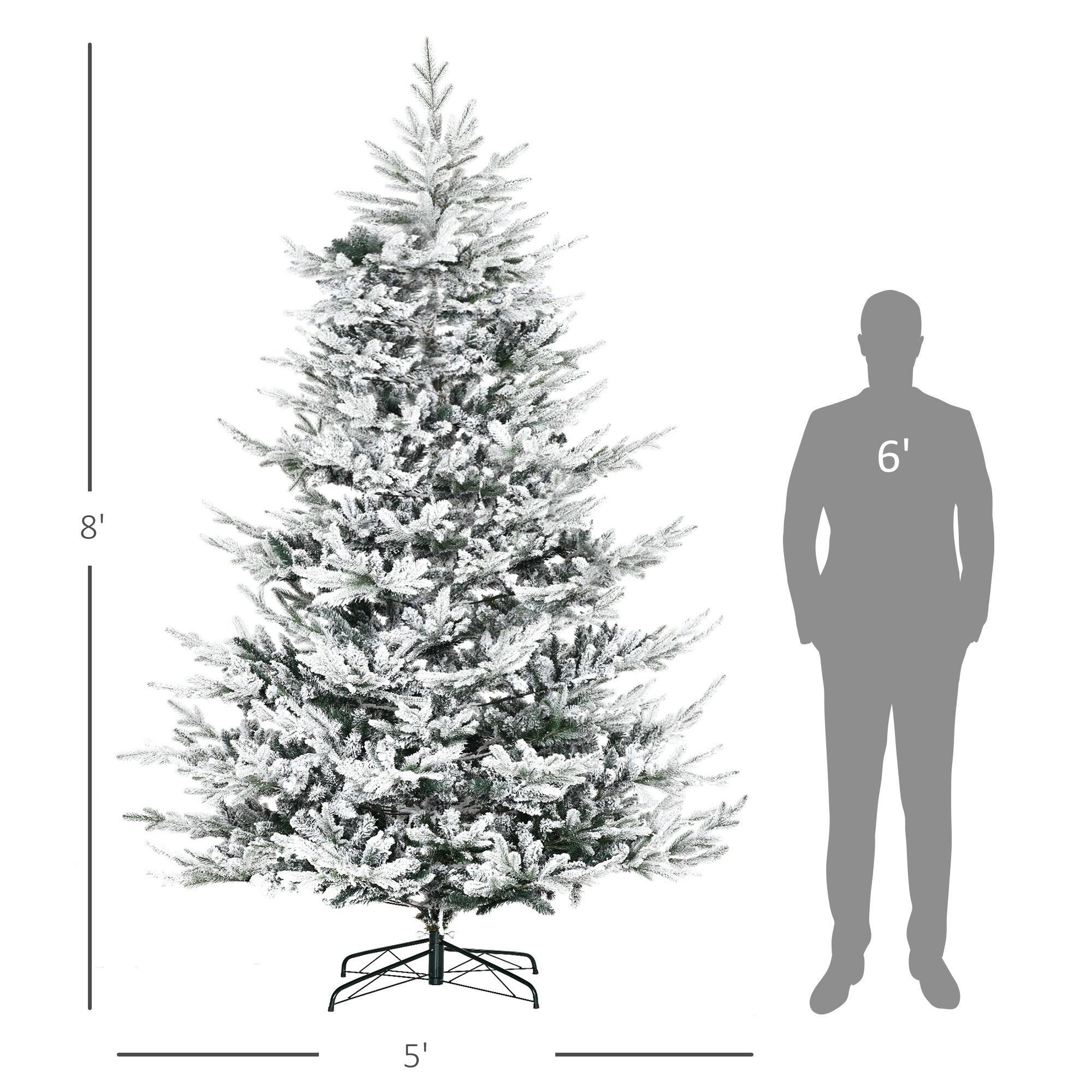 Left. BreeBe - 8 Foot Pine Snow Flocked Artificial Christmas Tree with 1479 Realistic Cedar Branches - Green.