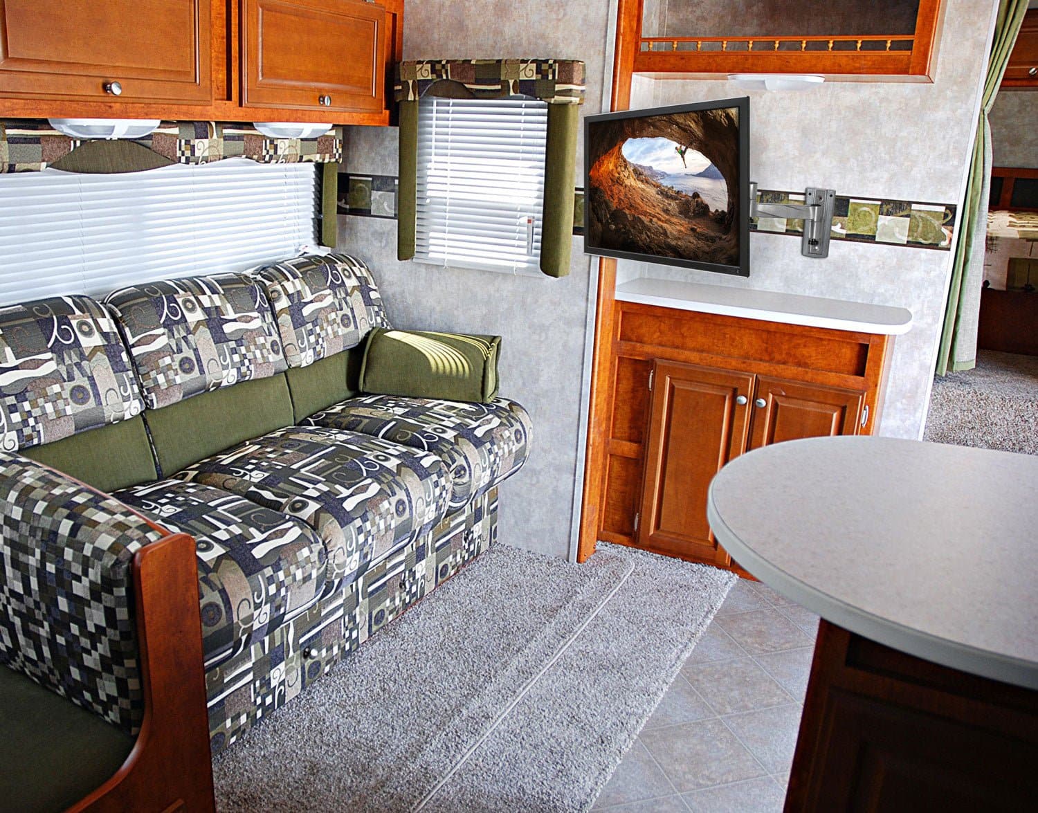 Left. Mount-It! - Full Motion Lockable RV TV Mount for 22–42" Screens, Tilts & Swivels (55° Up, 35° Down), 15.3" Extension, 33 lb Cap. - Silver.