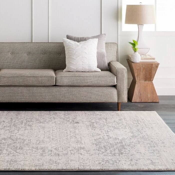 Angle. Hivvago - 5' x 7' Distressed Oriental Area Rug in Light Grey / Beige - Light Grey / Beige.