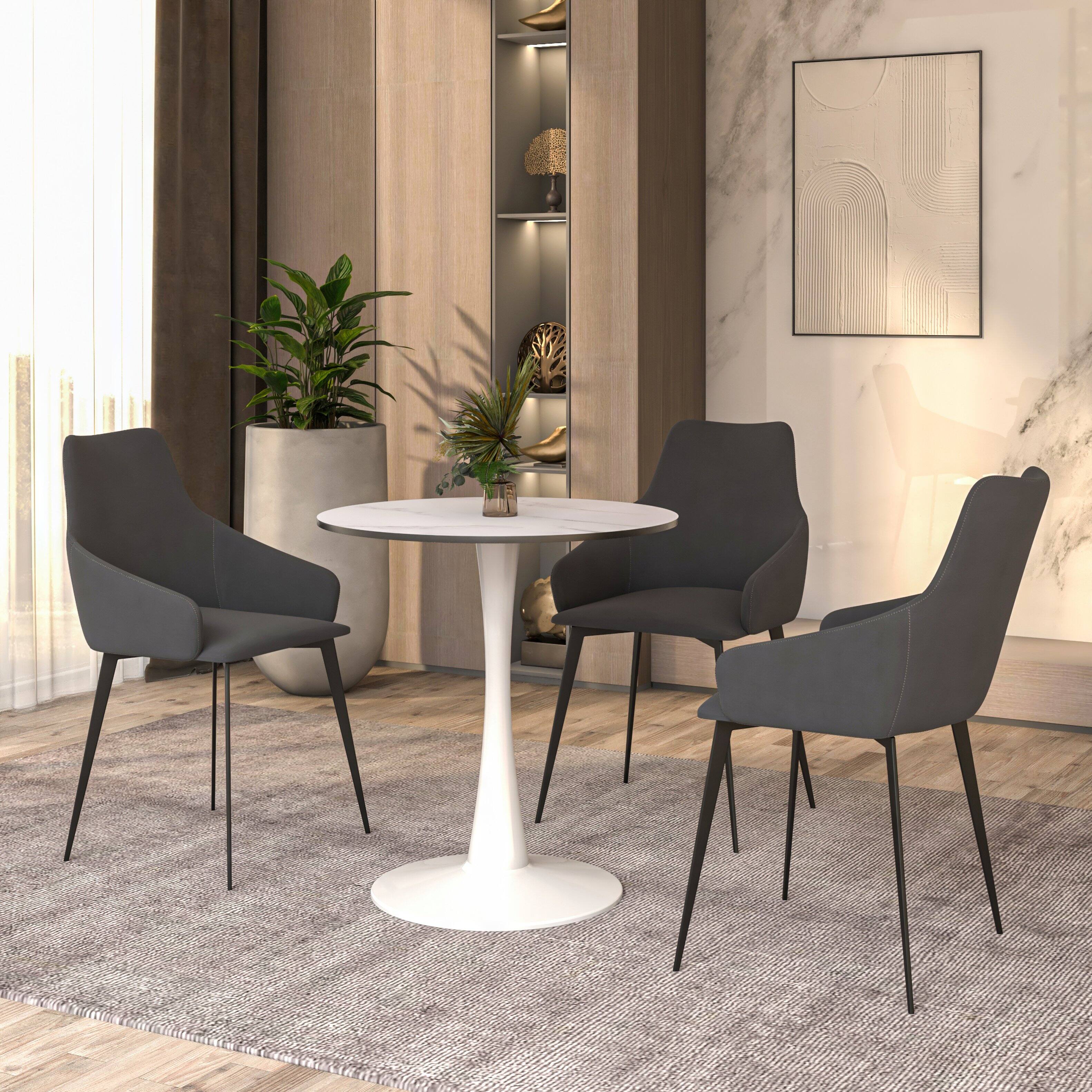 Angle. LeisureMod - Bristol 24" Modern Round Dining Table with White Pedestal Base for Kitchen & Compact Spaces - MDF - Marbled White.