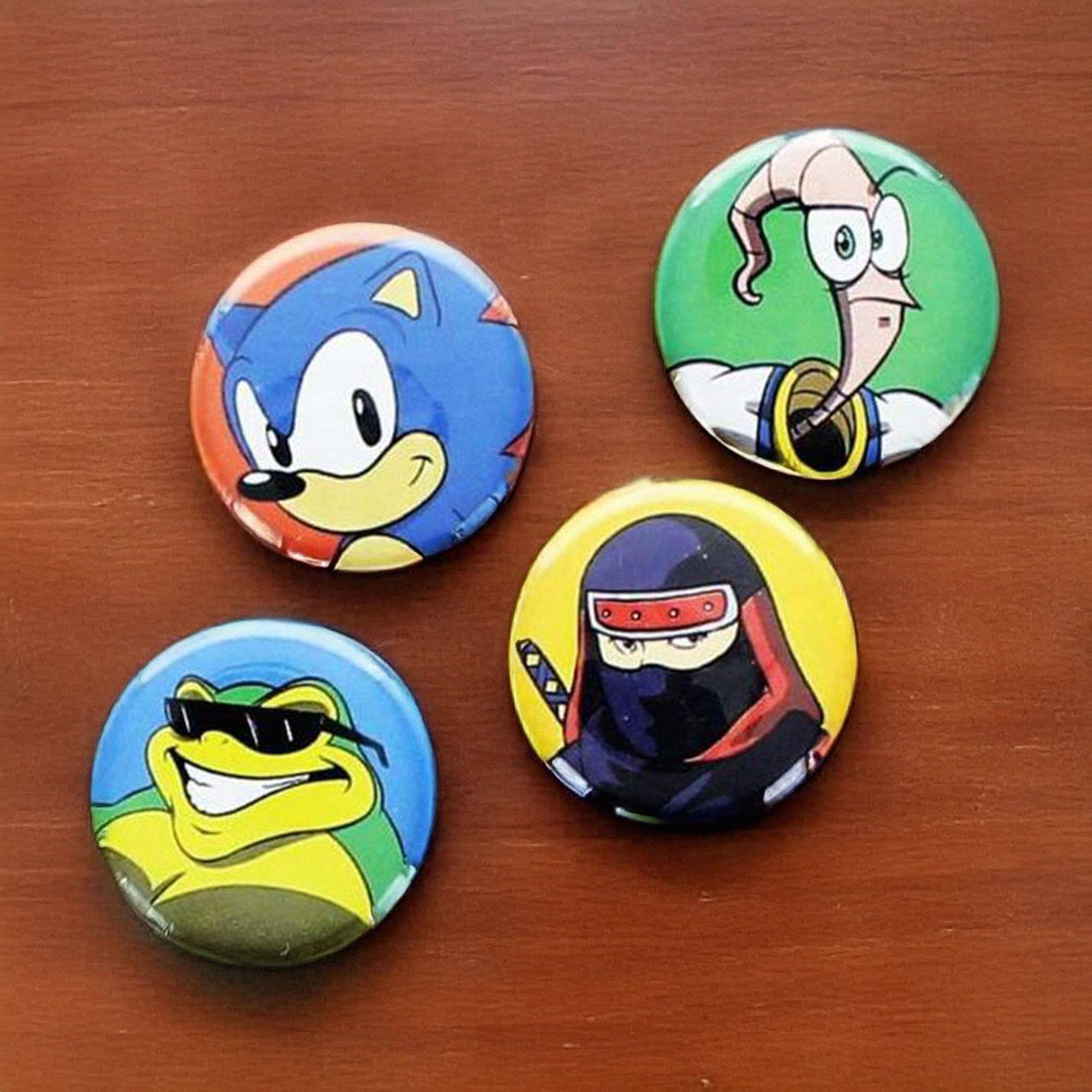 Alt View 10. Nerd Block - Sega Genesis Classic Game Characters Button 4 Pack - Multicolored.