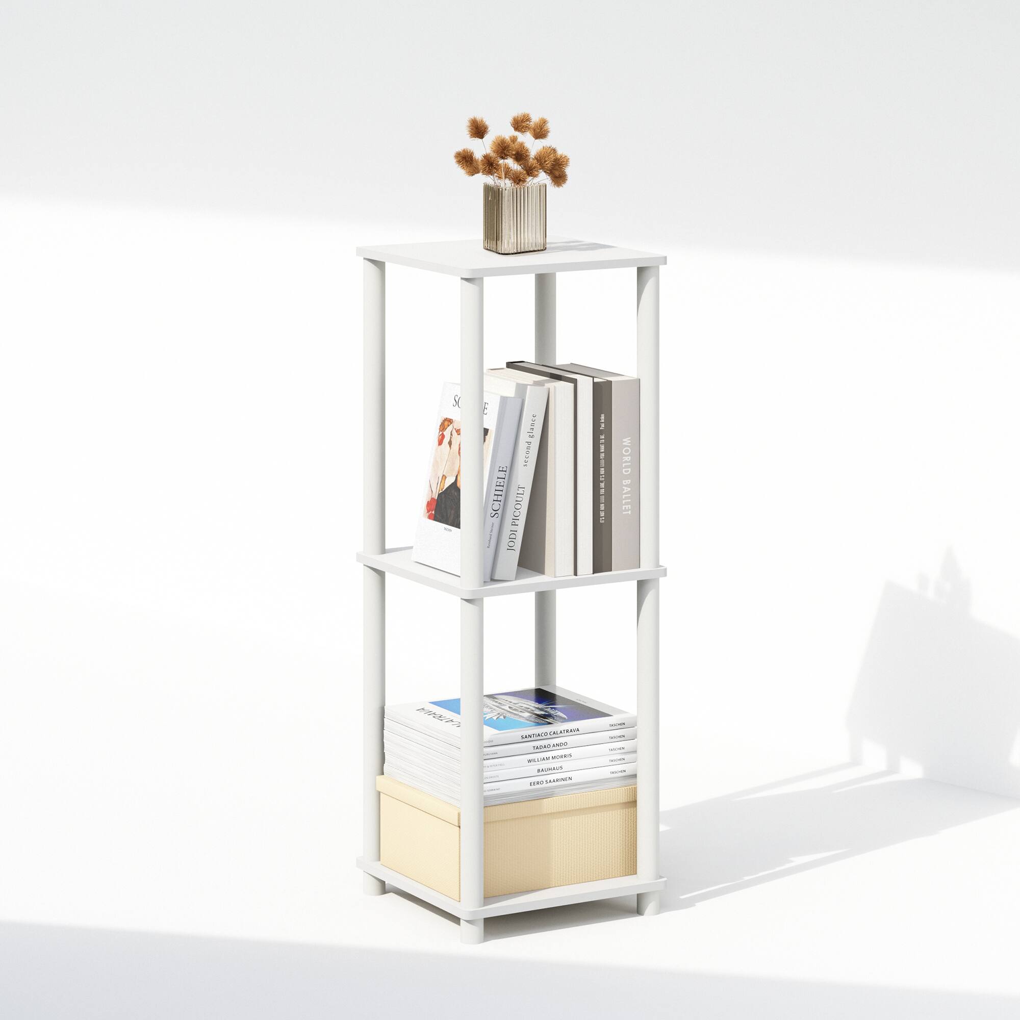 Sure, here is the corrected and grouped text from the image:

---

**Top Shelf:**
- (No visible text)

**Second Shelf:**
- Egon Schiele
- World Ballet

**Third Shelf:**
- (No visible text)

**Bottom Shelf:**
- (No visible text)

**Drawer:**
- (No visible text)

**Additional Text:**
- (No visible text)

---

This text is based on the visible titles and names on the books and items in the image.