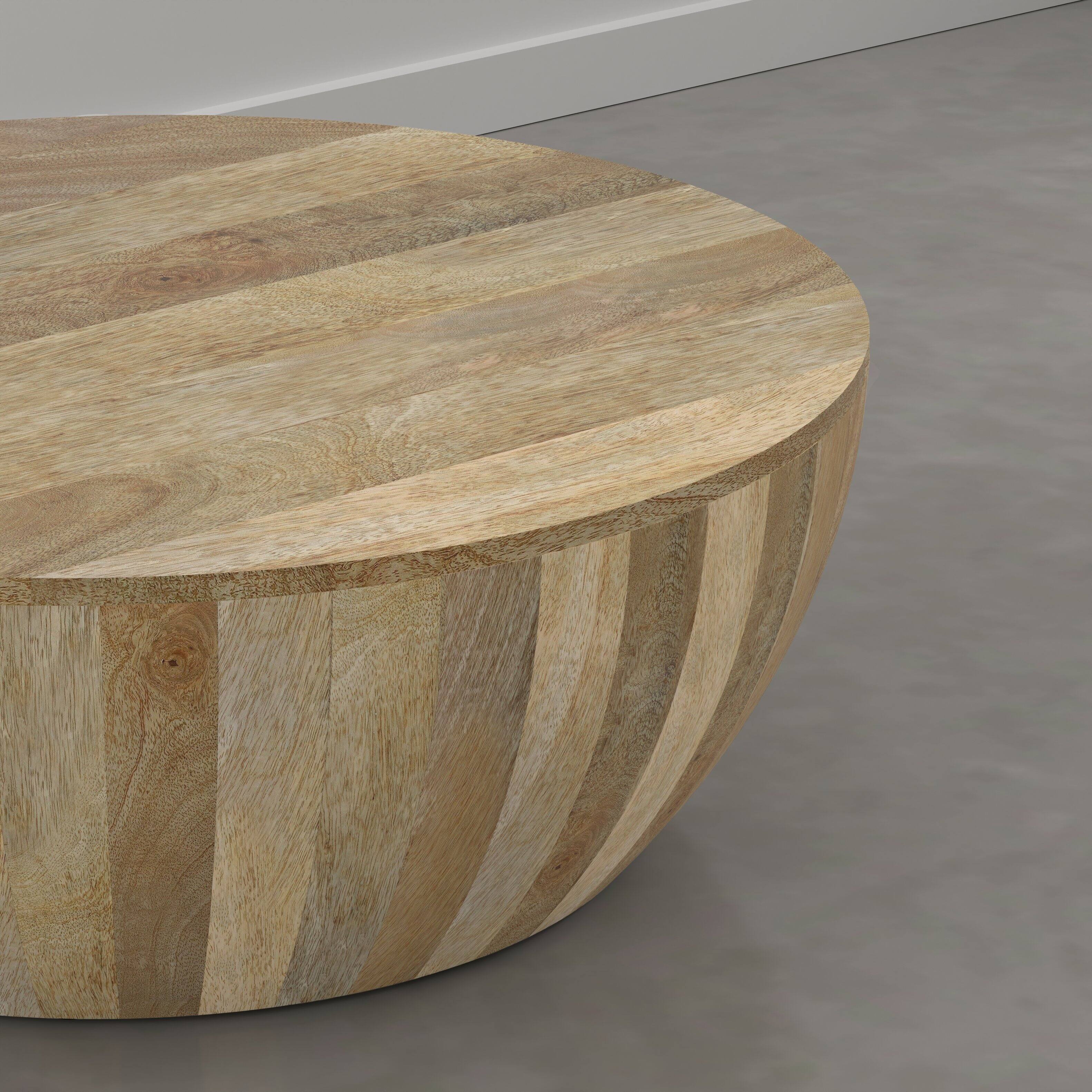 Alt View 1. Simpli Home - Elmbrook 34 inch Wide Solid Mango Wood Drum Coffee Table, Natural Blonde - Natural Blonde.