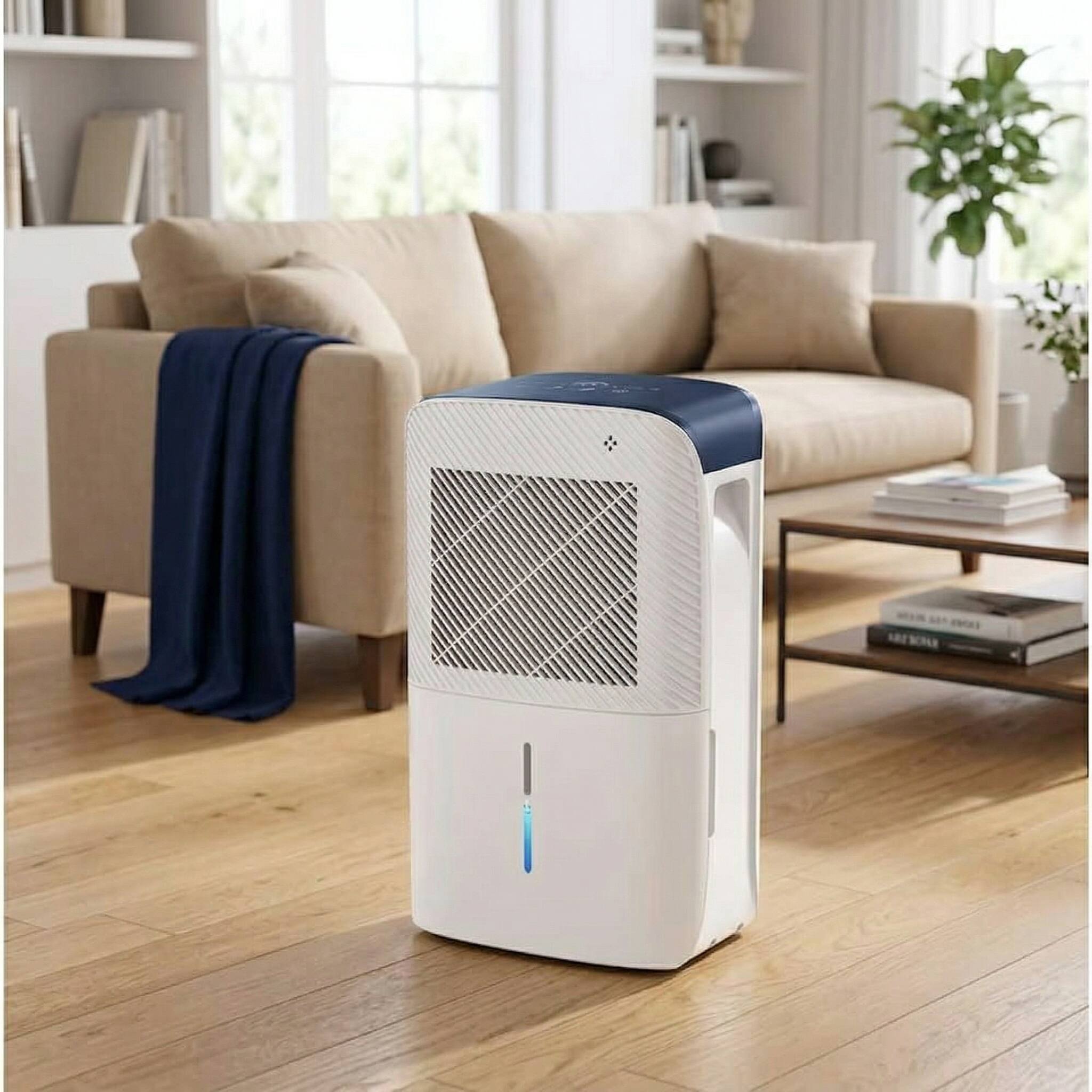Left. Airplus - 2000 Sq. Ft 38 Pints Portable Dehumidifier with 6.55 pt. Bucket Auto Defrost.