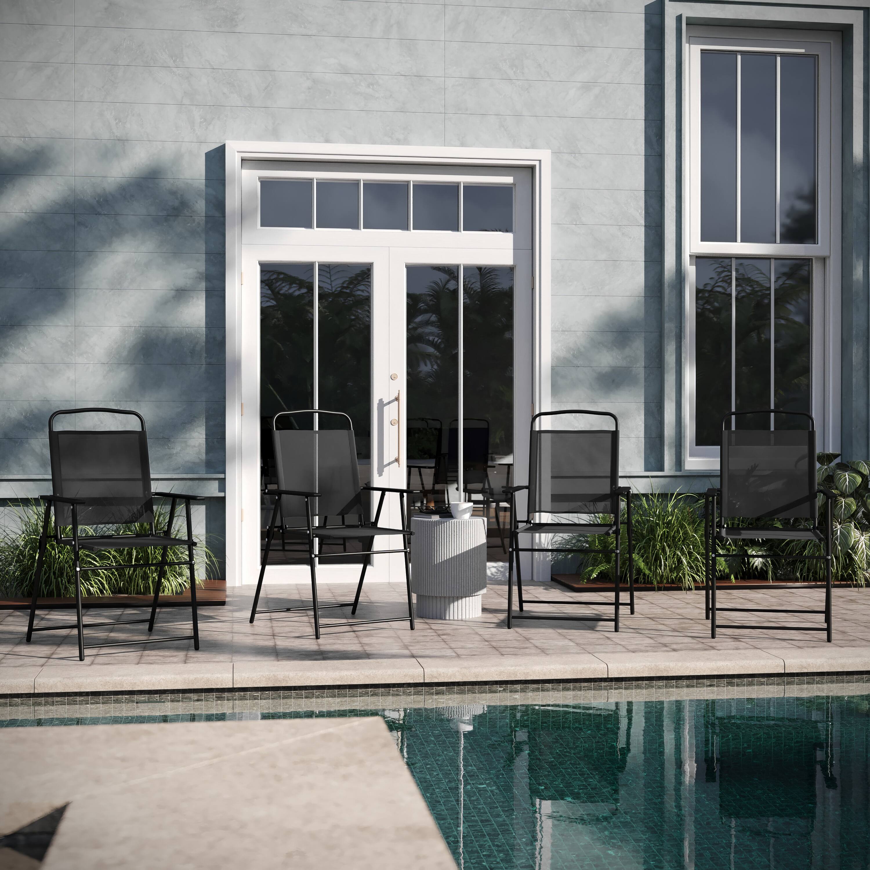 Alt View 2. Emma + Oliver - Munroe Set of 4 Textilene Folding Sling Style Patio Chairs with Armrests - Black.