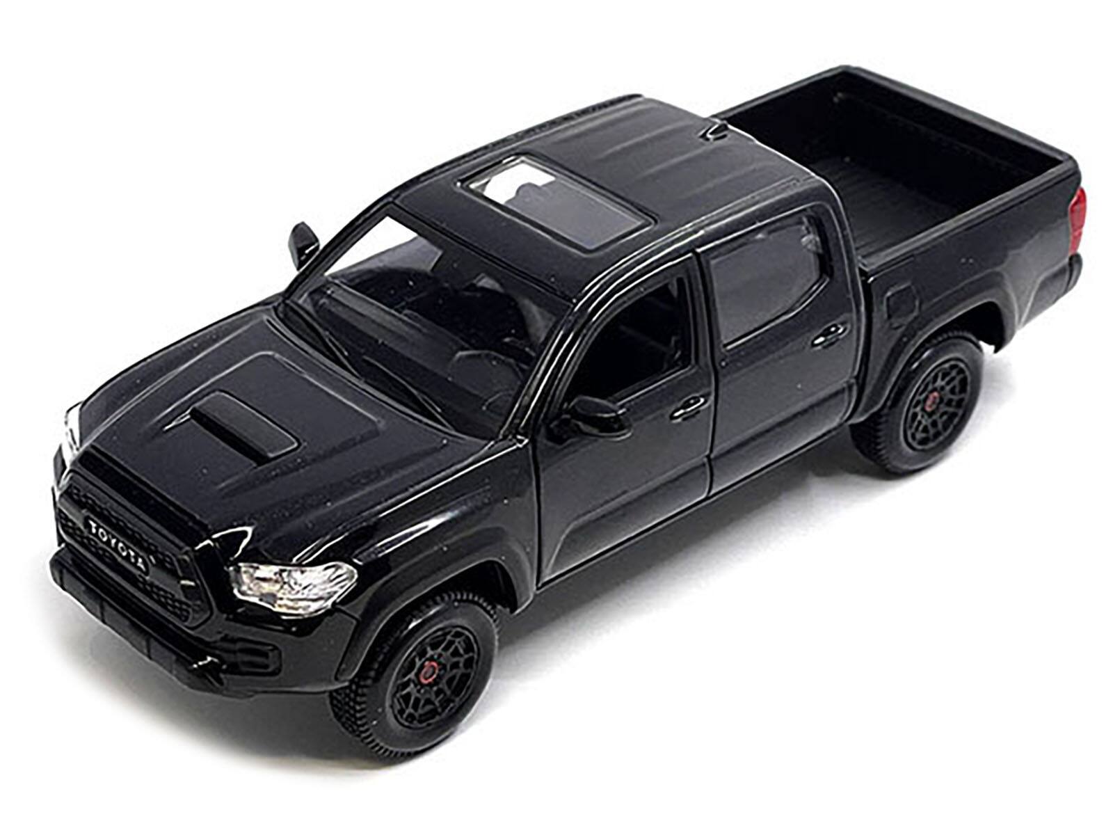 Angle. Maisto - 2023 Toyota Tacoma TRD PRO Pickup Truck Black Metallic with Sunroof "Special Edition" Series 1/27 - Black Metallic.