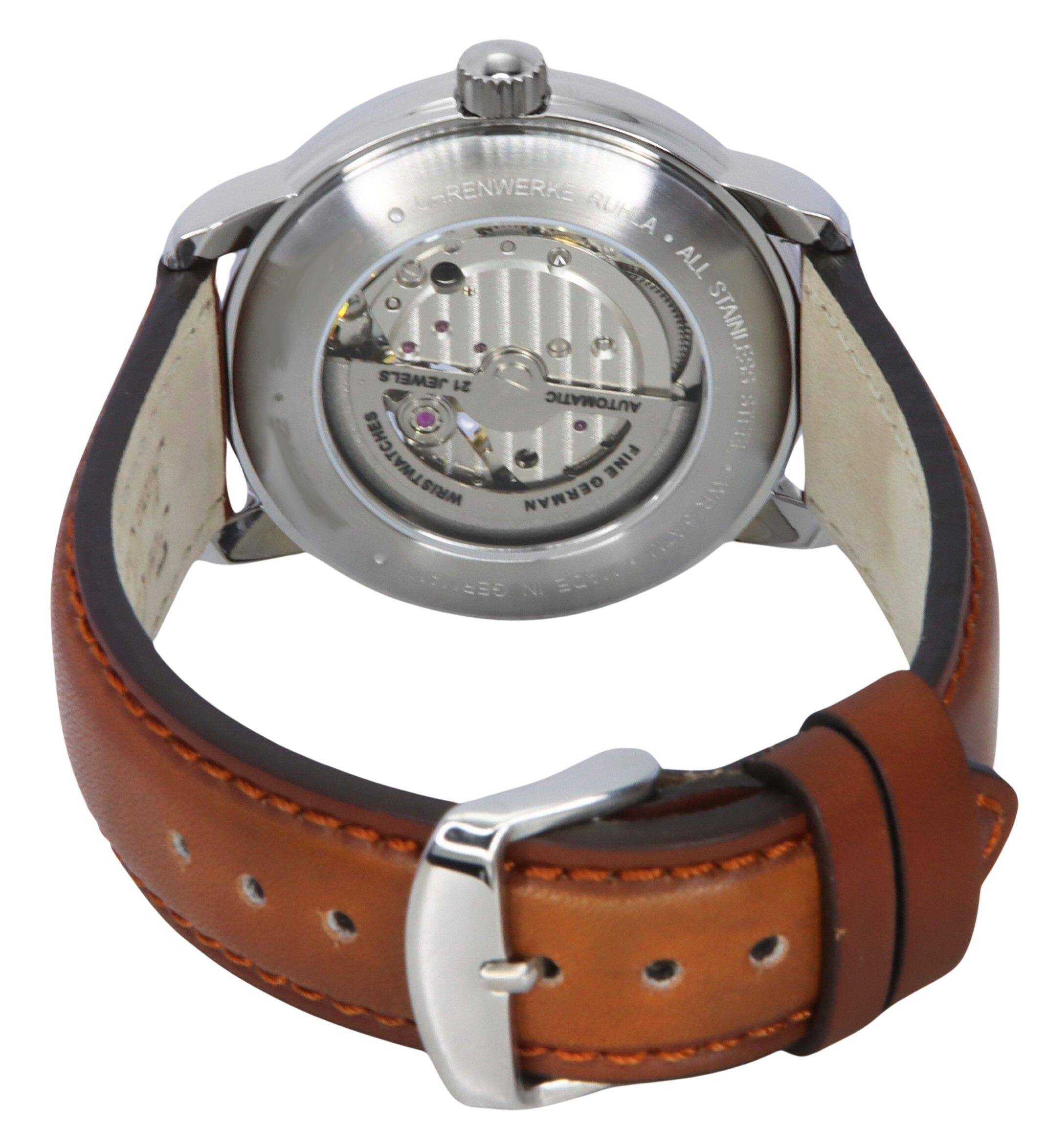 HRENWERKE RÜHLA  
ALL STAINLESS  
AUTOMATIC  
FINE GERMAN WATCHES  
17 JEWELS  
21 JEWELS  
AUTOMATIC  
WATER RESISTANT  
MADE IN GERMANY