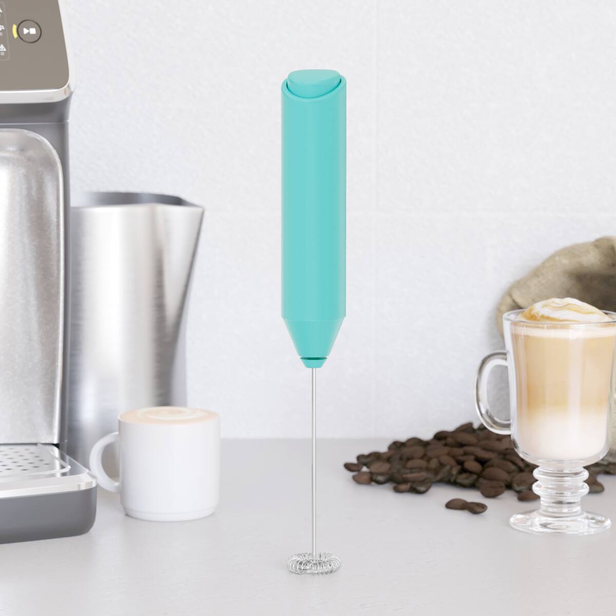 Left. Tooloton - Handheld Milk Frother, Mini Foam Maker for Coffee, Matcha and Hot Chocolate, Stand Included, Aqua - Aqua.