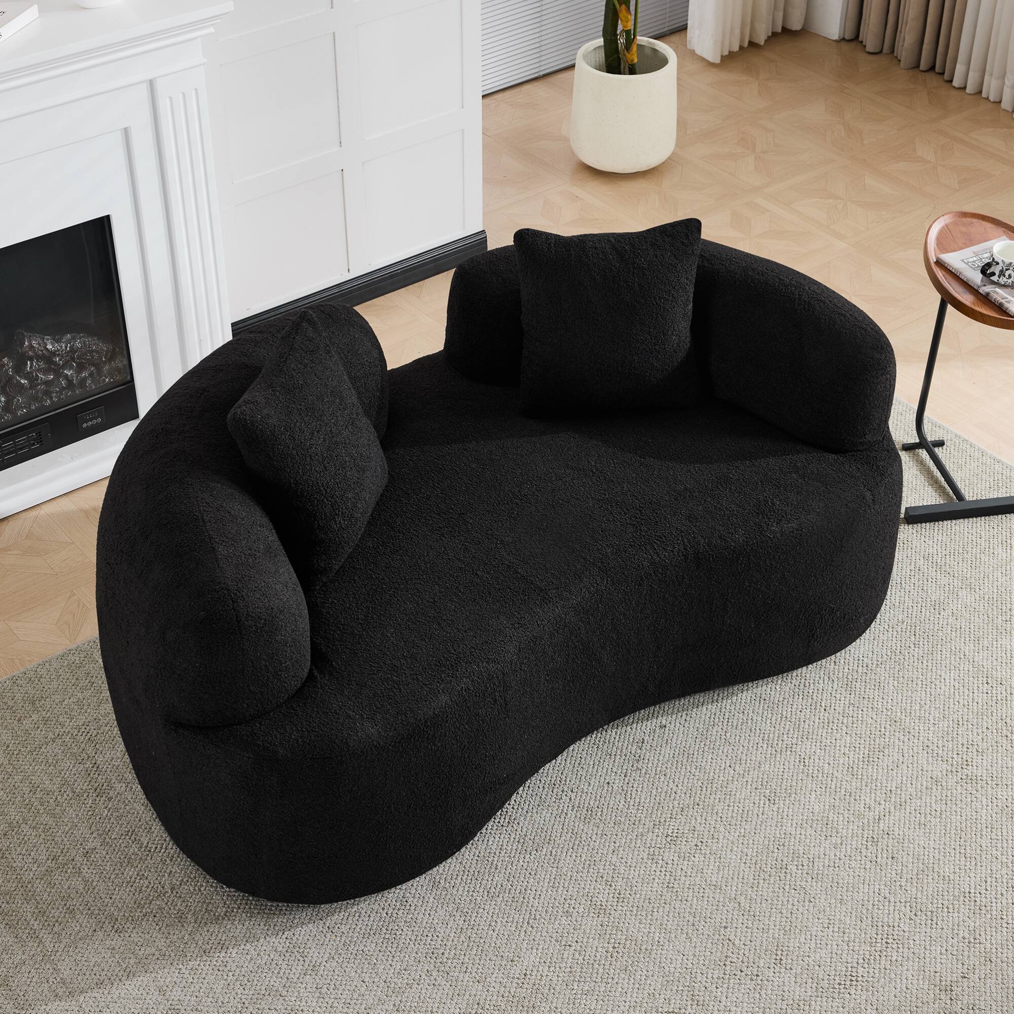 Angle. GOODSILO - Modern Curved Loveseat Sofa with Teddy Velvet Fabric for Small Spaces and Apartments - Black.